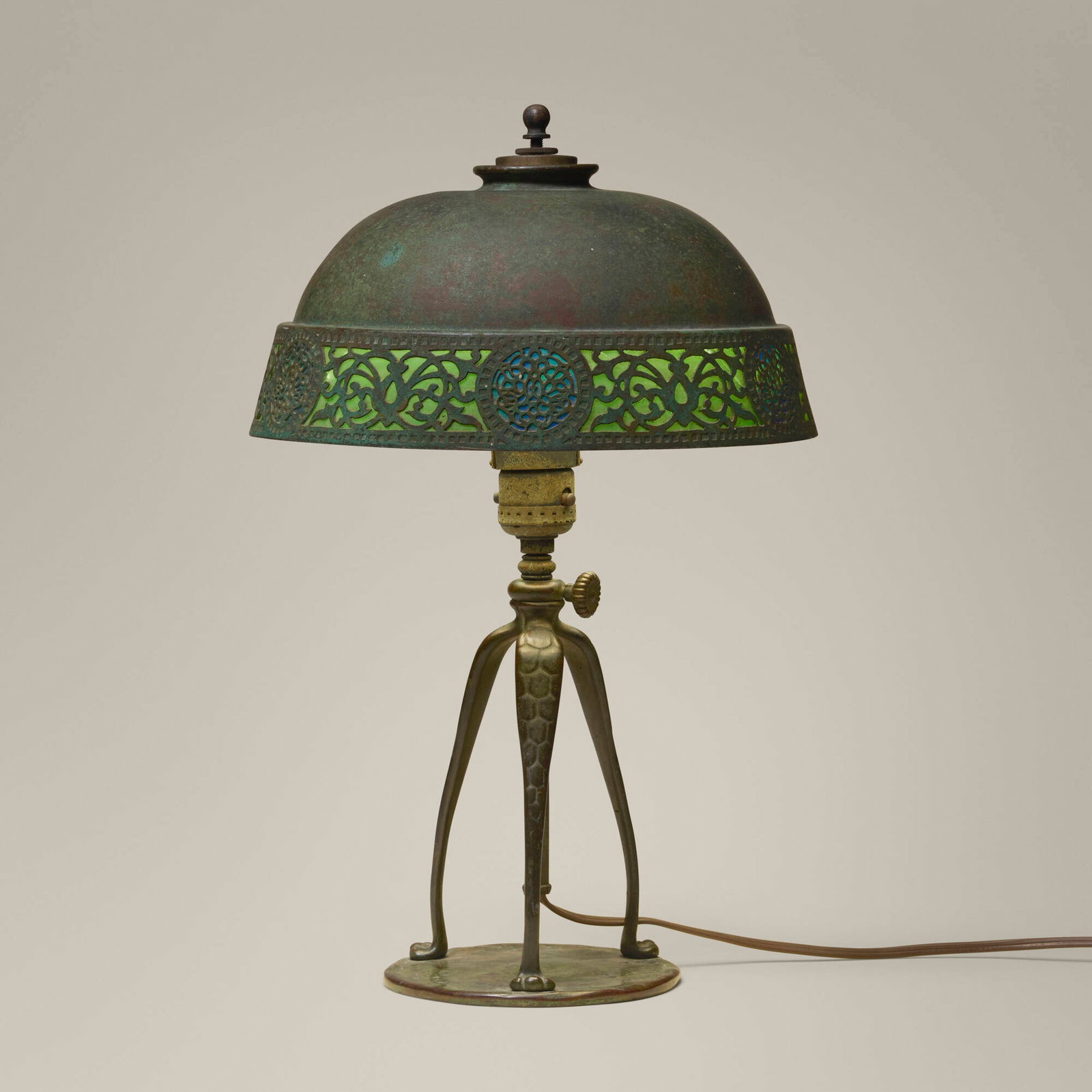 Tiffany Studios, Adjustable Etched Band table lamp: Tiffany Studios Adjustable Etched Band table lamp USA, c. 1910 patinated bronze, slag glass 15.75 h x 10 dia in (40 x 25 cm) Lamp features an adjustable Crutch Slide base. Impressed