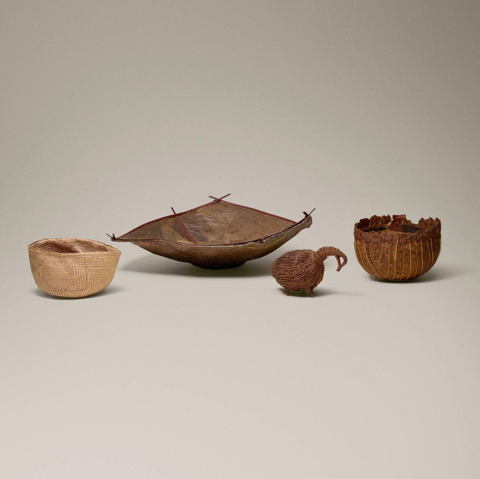 Various Artists, Collection of four works: Various Artists Collection of four works Gampi paper, paper, bamboo, wax, raffia, woven and dyed grass, twigs, string largest: 6 h x 19.5 w x 19 d in (15 x 50 x 48 cm) smallest: 4 h x 7.25 w x 4 d in 