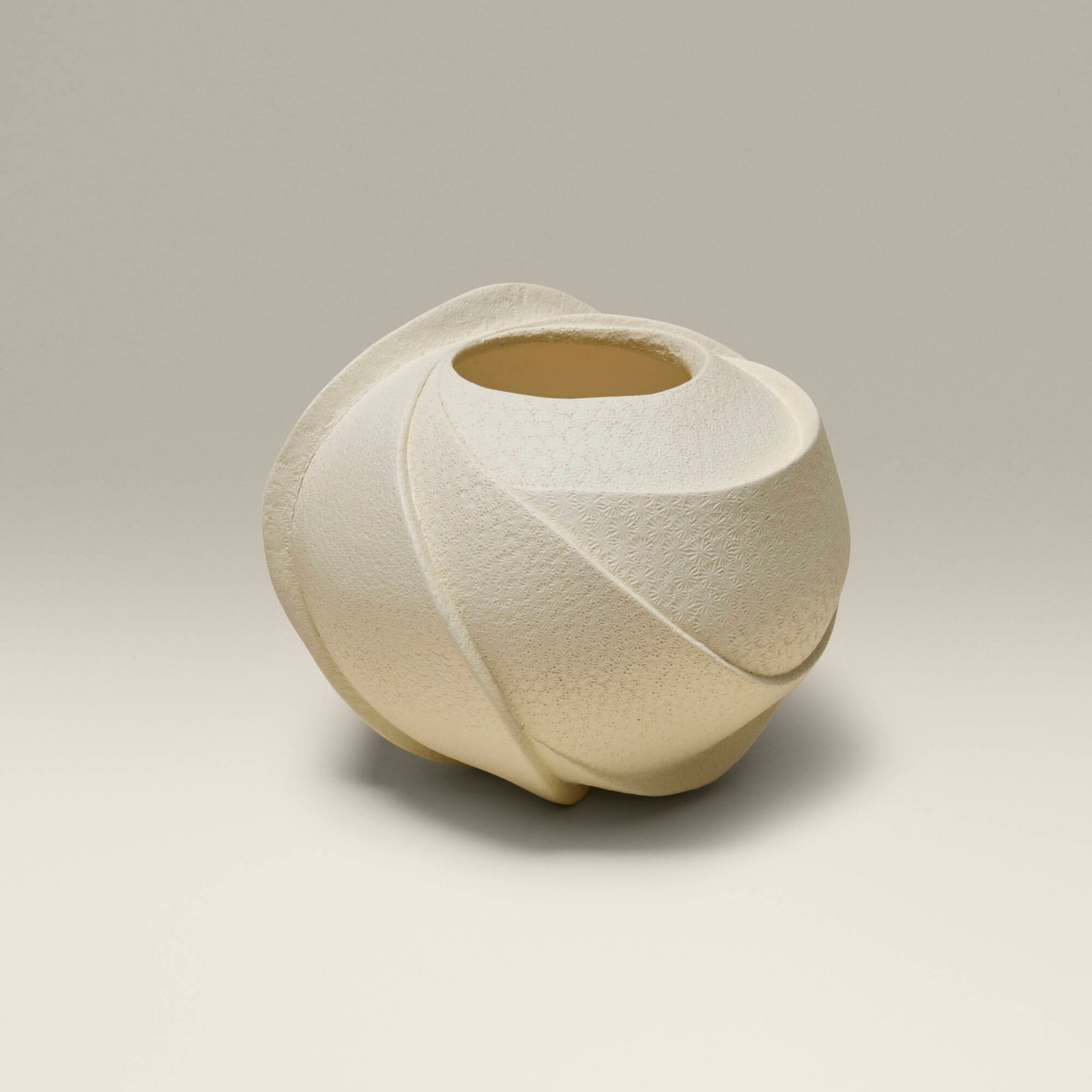 Suto Satoshi, Vessel: Suto Satoshi Vessel Japan, 21st century bisque stoneware with impressed decoration 4.25 h x 5.25 dia in (11 x 13 cm) Impressed maker's mark to underside. Provenance: Collection of Jack Lenor