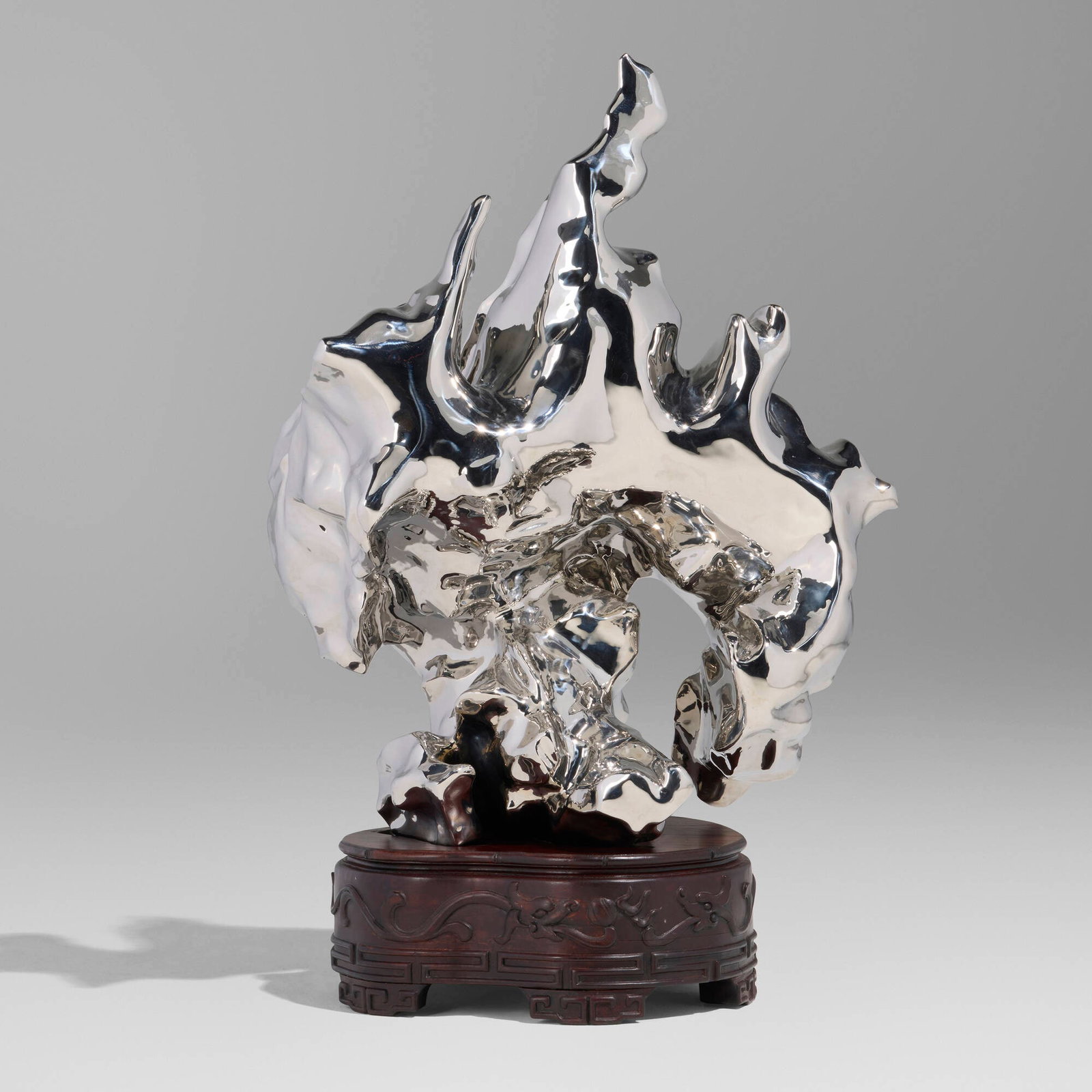 Zhan Wang, Artificial Rock No. 81: Zhan Wang Artificial Rock No. 81 2005 stainless steel and wood base 29 h x 19 w x 12 d in (74 x 48 x 30 cm) Signed, dated, and numbered to lower side 'Zhan Wang 4/4 2005'. This work is