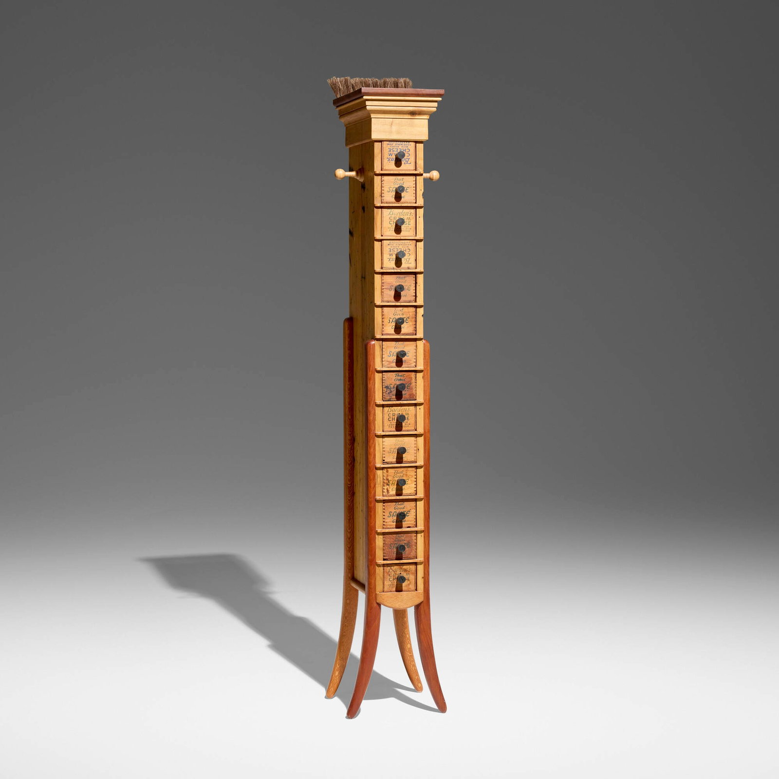Tommy Simpson, Stacked chest of drawers: Tommy Simpson Stacked chest of drawers USA, 1999 chestnut, butternut, lacewood, mahogany, vintage cream cheese boxes, horsehair 65.5 h x 11 w x 13 d in (166 x 28 x 33 cm) Chest features fourteen drawe