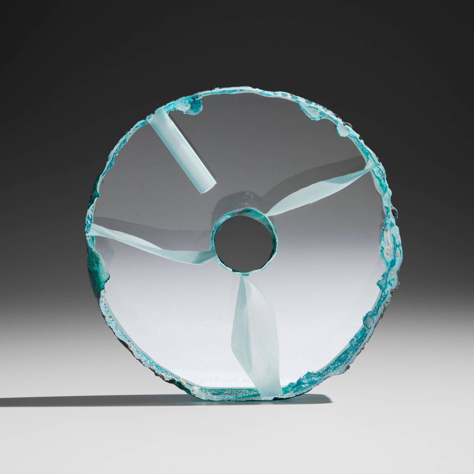 Colin Reid, R943: Colin Reid R943 2000 cast and polished optical glass 6.5 h x 6.5 w x 2.375 d in (17 x 17 x 6 cm) Etched signature, date, and title to lower edge 'Colin Reid 2000 R943'. Provenance: Private