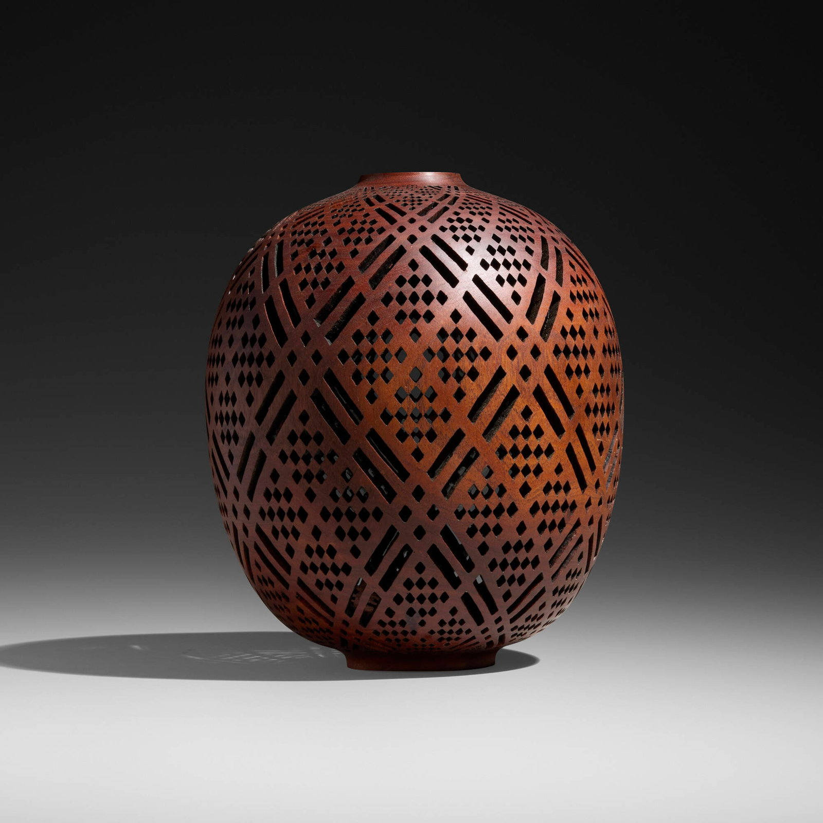J. Paul Fennell, Tessellations vessel: J. Paul Fennell Tessellations vessel 2026 acacia 10 h x 8.5 dia in (25 x 22 cm) Incised signature, date, wood type and number to underside 'J. Paul Fennell 2026 Acacia 777'. Provenance: The