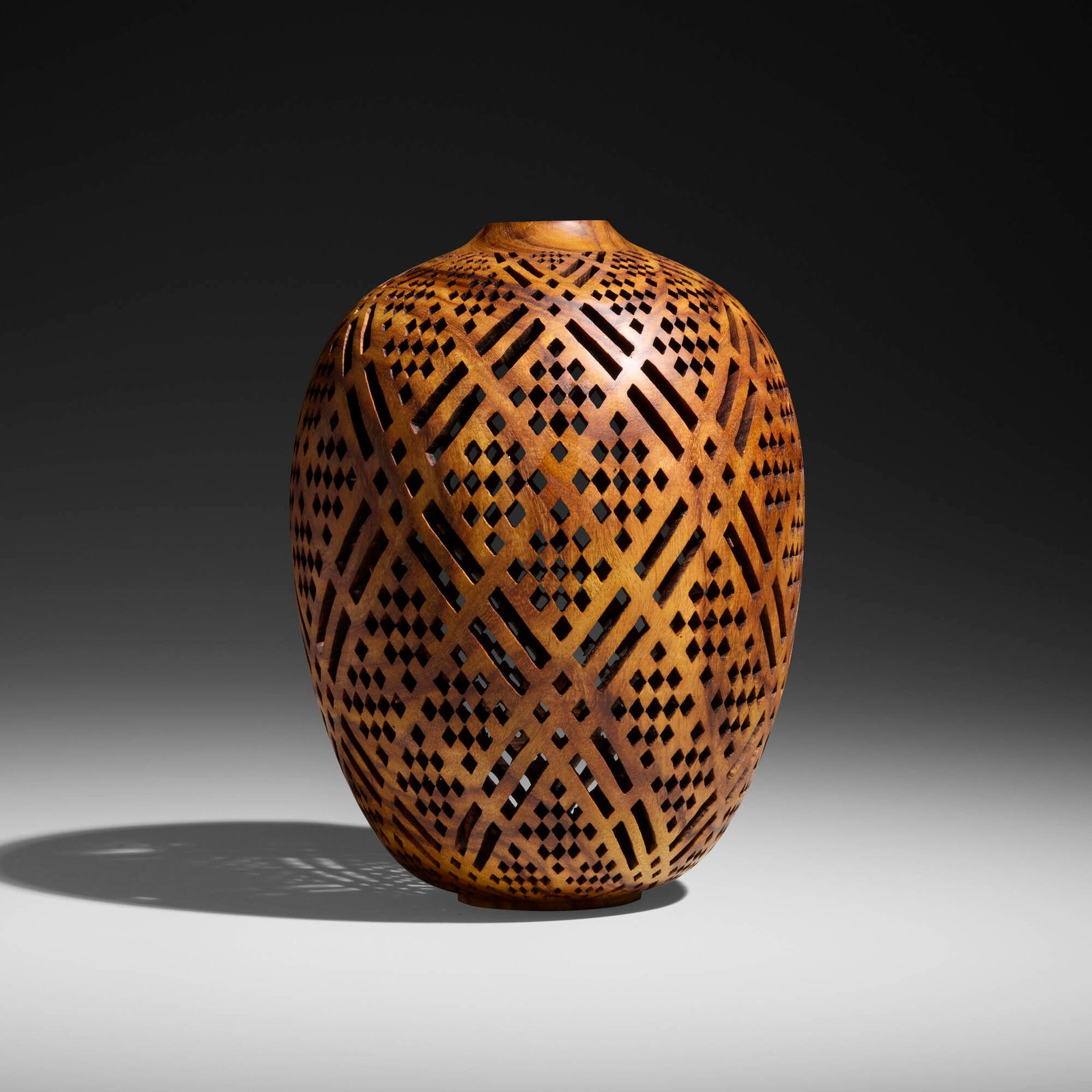 J. Paul Fennell, Parallelogram vessel: J. Paul Fennell Parallelogram vessel 2026 East Indian rosewood 9.875 h x 7.5 dia in (25 x 19 cm) Incised signature, date, and number to underside 'J. Paul Fennell 2026 D.515500 782'.