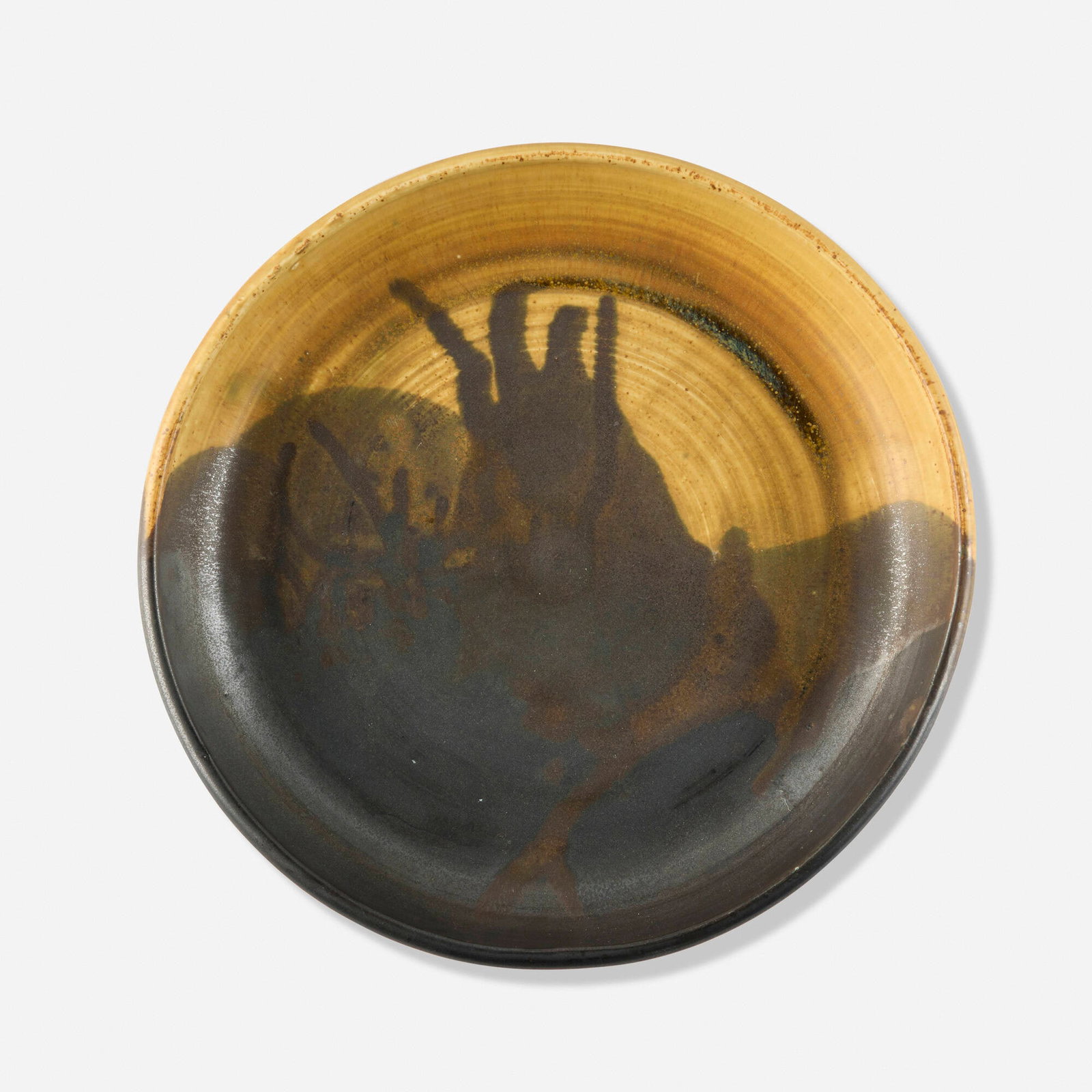 Toshiko Takaezu, Plate: Toshiko Takaezu Plate c. 1980 glazed porcelain 2 h x 11.75 w x 11.5 d in (5 x 30 x 29 cm) Incised signature to underside 'TT'. Provenance: Private Collection, California This work will ship from