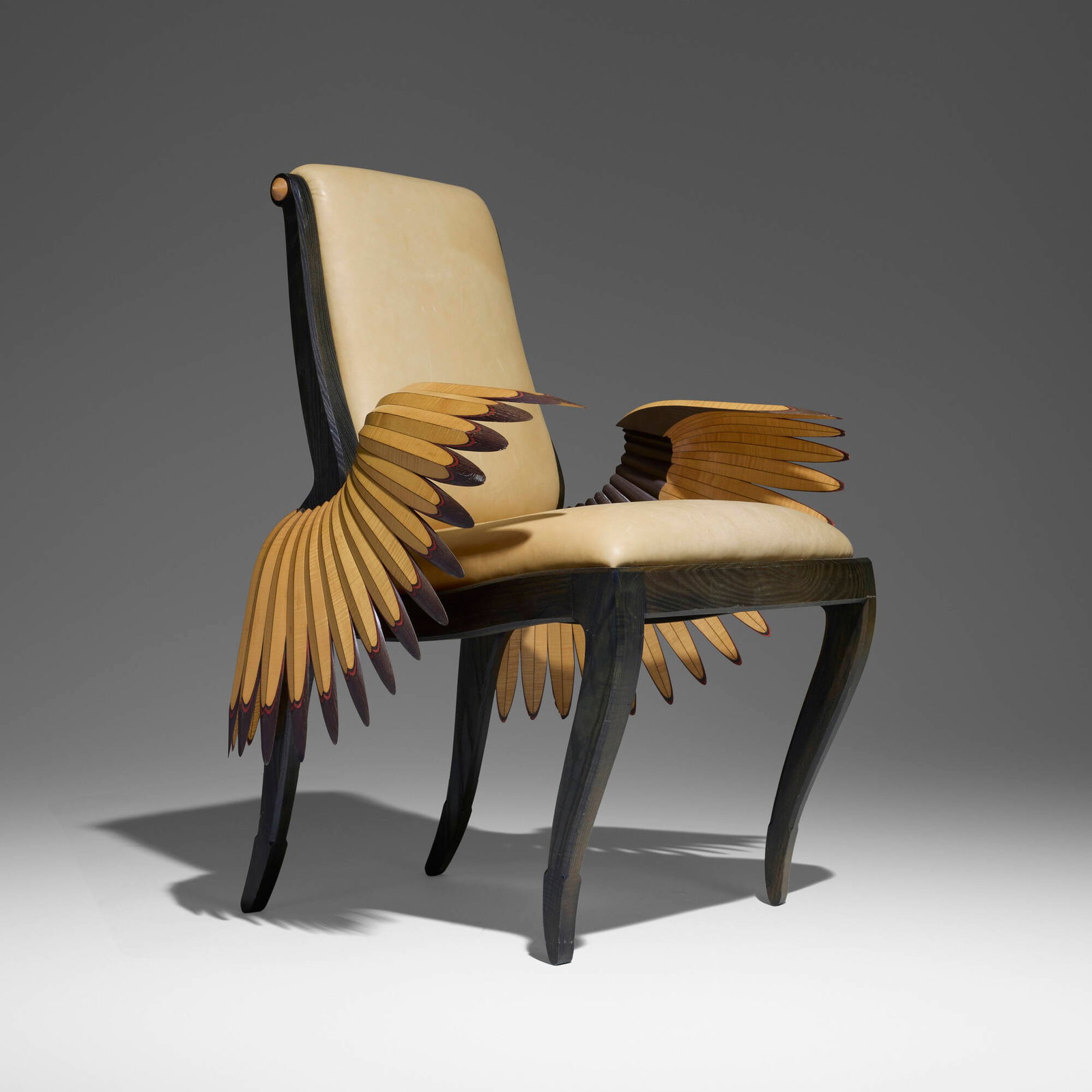 Stephen Smith Daniell, Icarus chair: Stephen Smith Daniell Icarus chair USA, 1993 aniline-dyed oak and curly maple, leather upholstery 36.75 h x 31.25 w x 25.5 d in (93 x 79 x 65 cm) Paper studio label to underside 'Stephen Smith Da