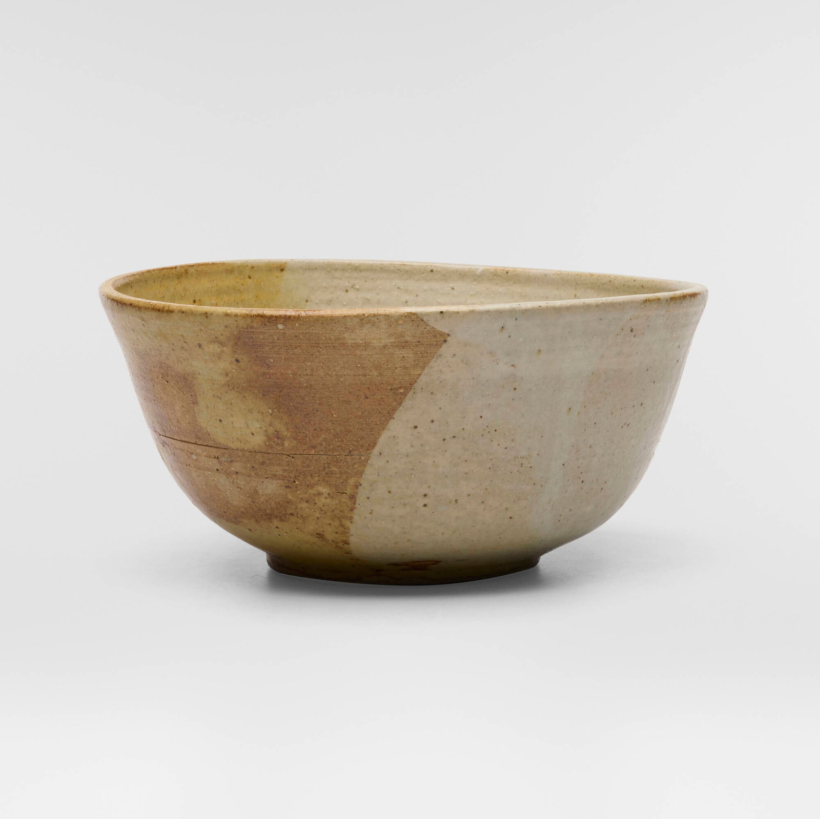 Toshiko Takaezu, Bowl: Toshiko Takaezu Bowl c. 1985 glazed stoneware 4 h x 8.5 w x 8.25 d in (10 x 22 x 21 cm) Incised signature to underside 'TT'. Provenance: Acquired directly from the artist, Collection of Pearl and