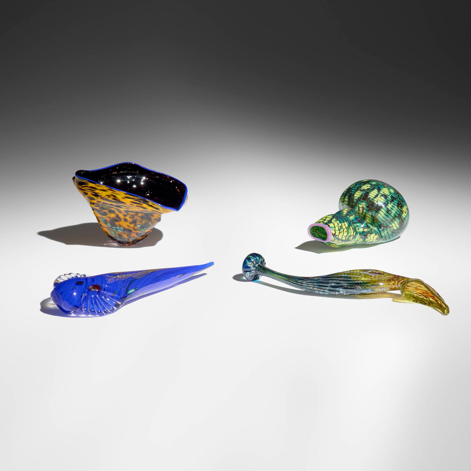 Dale Chihuly, Collection of four elements: Dale Chihuly Collection of four elements hand-blown glass largest: 8.125 h x 2 w x 1 d in (21 x 5 x 3 cm) smallest: 2.5 h x 5.5 w x 3 d in (6 x 14 x 8 cm) Elements were likely part of a larger group