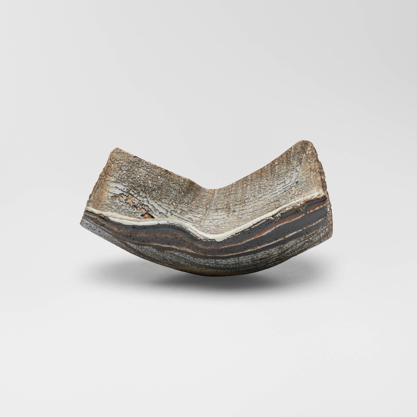 Jacques Kaufmann, Untitled: Jacques Kaufmann Untitled c. 2010 glazed stoneware 3.375 h x 7 w x 5.875 d in (9 x 18 x 15 cm) Impressed artist's cipher to underside 'K'. This work will ship from Lambertvill