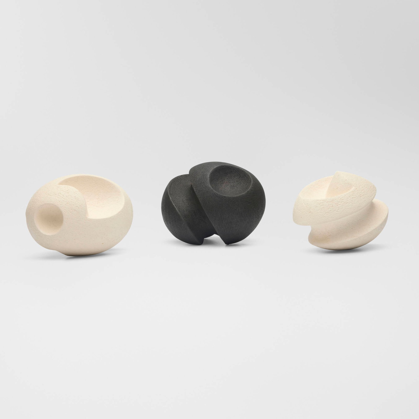 James Oughtibridge, Untitled (three works): James Oughtibridge Untitled (three works) c. 2020 pigmented stoneware 3.75 h x 5.25 w x 3.75 d in (10 x 13 x 10 cm) 3.5 h x 5 w x 3.5 d in (9 x 13 x 9 cm) 3.25 h x 4.5 w x 3.25 d in (8 x 11 x 8 cm)