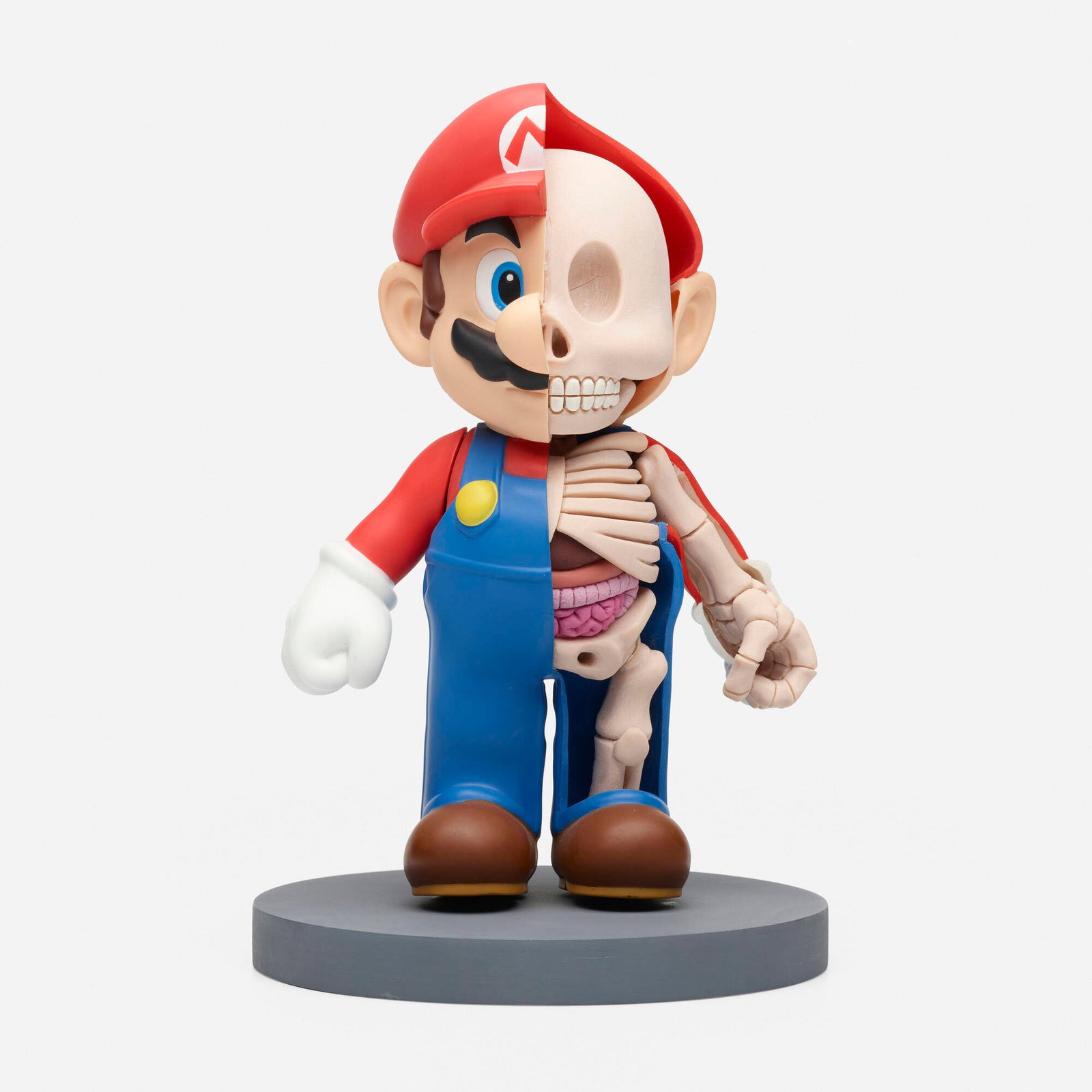 Jason Freeny, Mario Dissected: Jason Freeny Mario Dissected 2011 vinyl toy, epoxy clay, acrylic paint, wood 9.5 h x 6.25 dia in (24 x 16 cm) Signed and dated to verso 'Freeny 11 ?'. This work will ship from Lambertville,