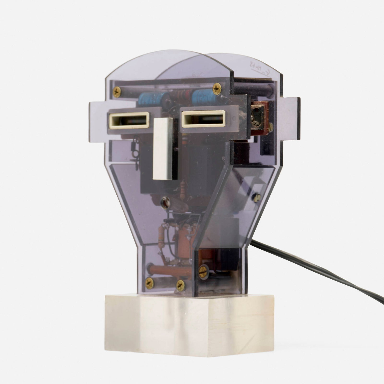 Gerard Haas, Head (from the Timescapes: LED Chronotype Light Sculpture series): Gerard Haas Head (from the Timescapes: LED Chronotype Light Sculpture series) 1970-79 Lucite, metal, light bulb 6.25 h x 4.75 w x 2.25 d in (16 x 12 x 6 cm) Incised signature to verso 'G. Haas'. This