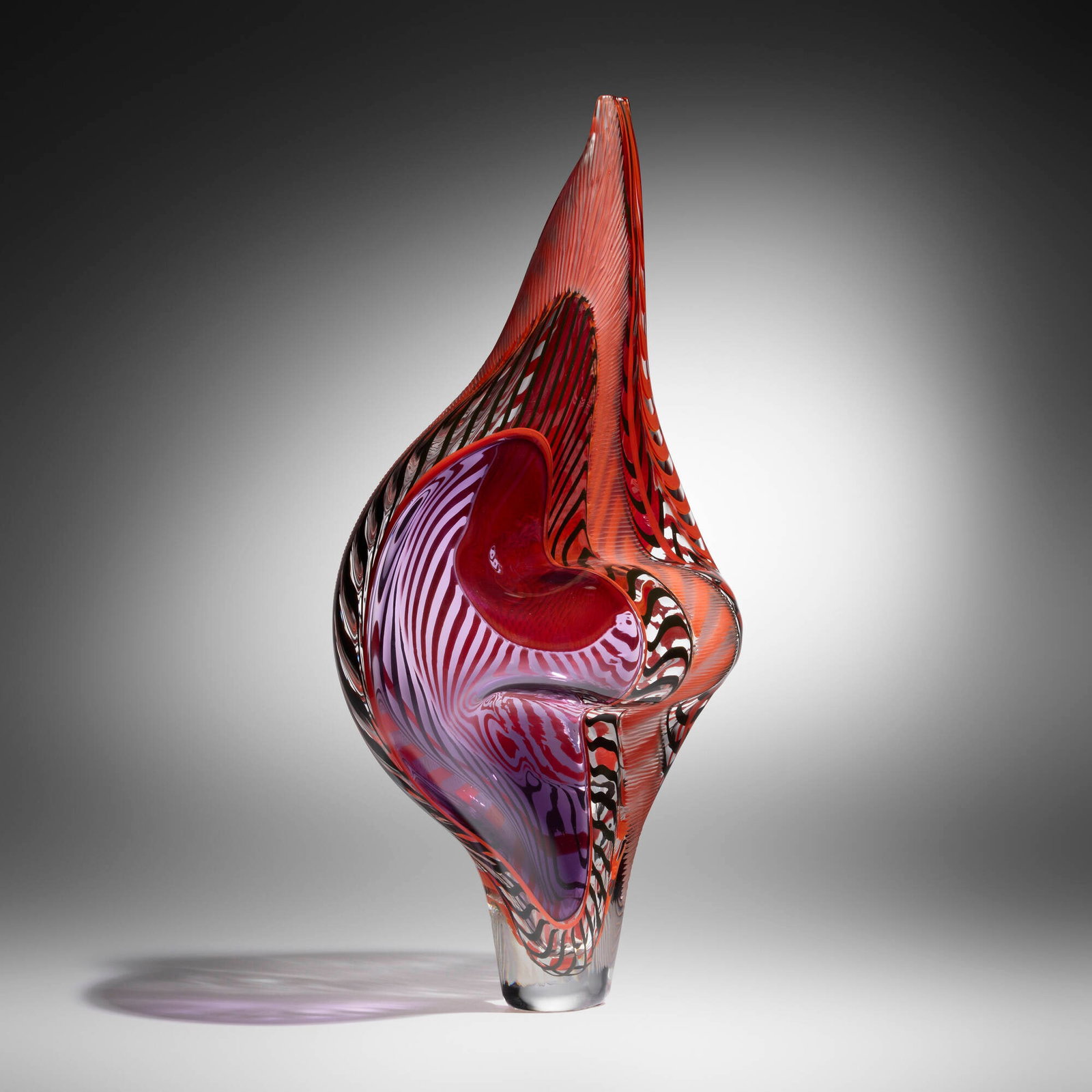 Lino Tagliapietra, Bilbao: Lino Tagliapietra Bilbao 2000 hand-blown glass, partial battuto and inciso surface 24 h x 12.5 w x 9 d in (61 x 32 x 23 cm) Etched signature and date to underside 'Lino Tagliapietra 2000'.