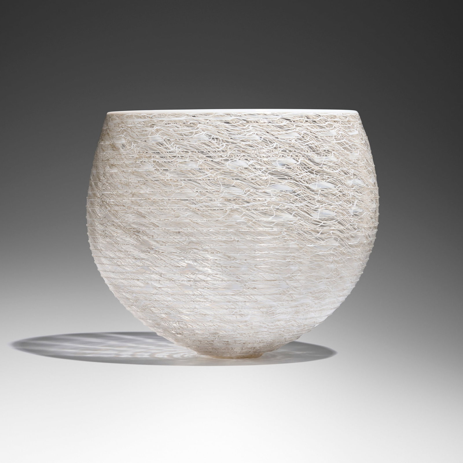 Tobias Mohl, Nest bowl: Tobias Mohl Nest bowl 2016 hand-blown glass with canework 7.875 h x 9.5 dia in (20 x 24 cm) Etched signature and date to underside 'Tobias Mohl 2016'. Provenance: Private Collection,