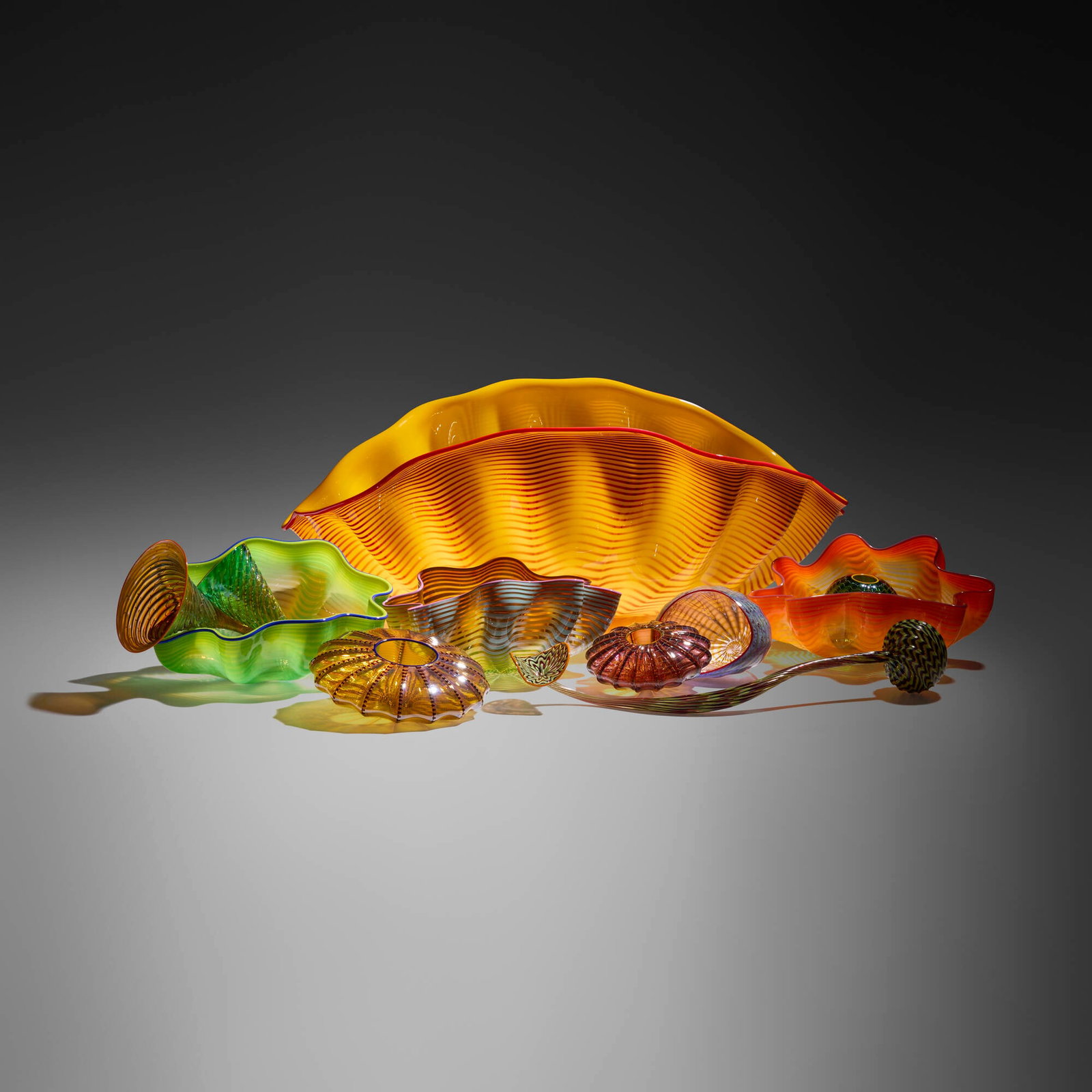 Dale Chihuly, Rainbow Seaform group: Dale Chihuly Rainbow Seaform group 2000 hand-blown glass 11.5 h x 29.875 w x 17 d in (29 x 76 x 43 cm) Group is composed of eleven elements, previously twelve. Etched signature and date to underside