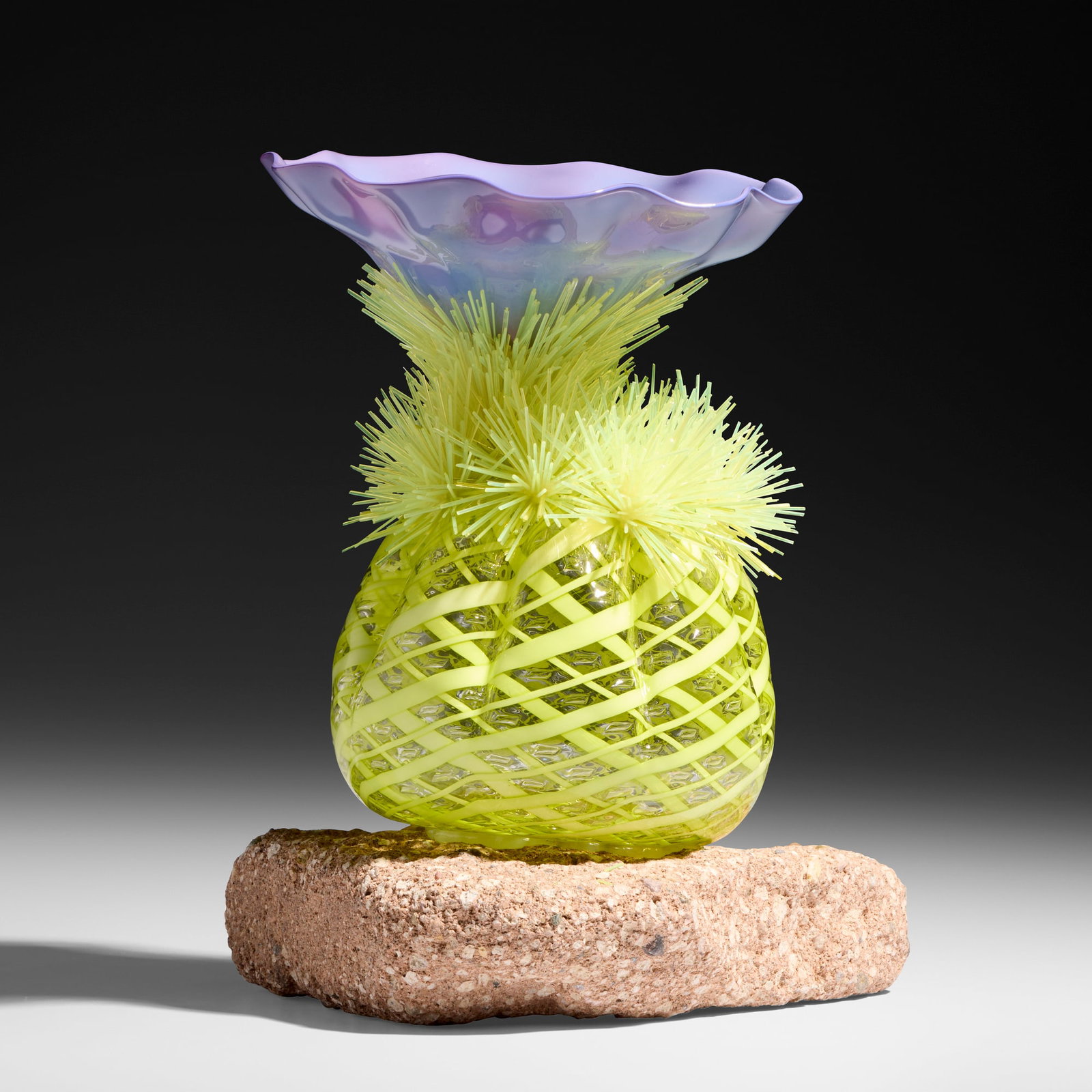 Flo Perkins, Reticello Cactus: Flo Perkins Reticello Cactus 2004/2026 hand-blown glass, glass threads, rock base 10 h x 8.875 w x 6.875 d in (25 x 23 x 17 cm) Work is composed of a glass element made in 2004 and a base which was