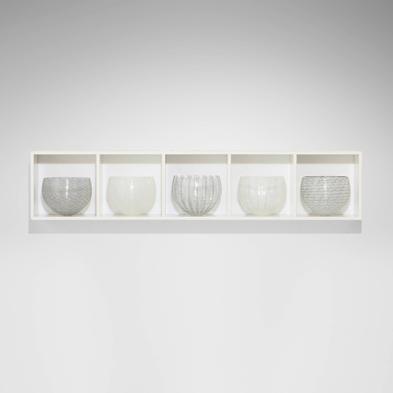 Tobias Mohl, Five Part Nest Collection: Tobias Mohl Five Part Nest Collection 2008 hand-blown glass with canework, painted wood, acrylic lightbox 8.75 h x 41.75 w x 8.25 d in (22 x 106 x 21 cm) Etched signature and date to underside of