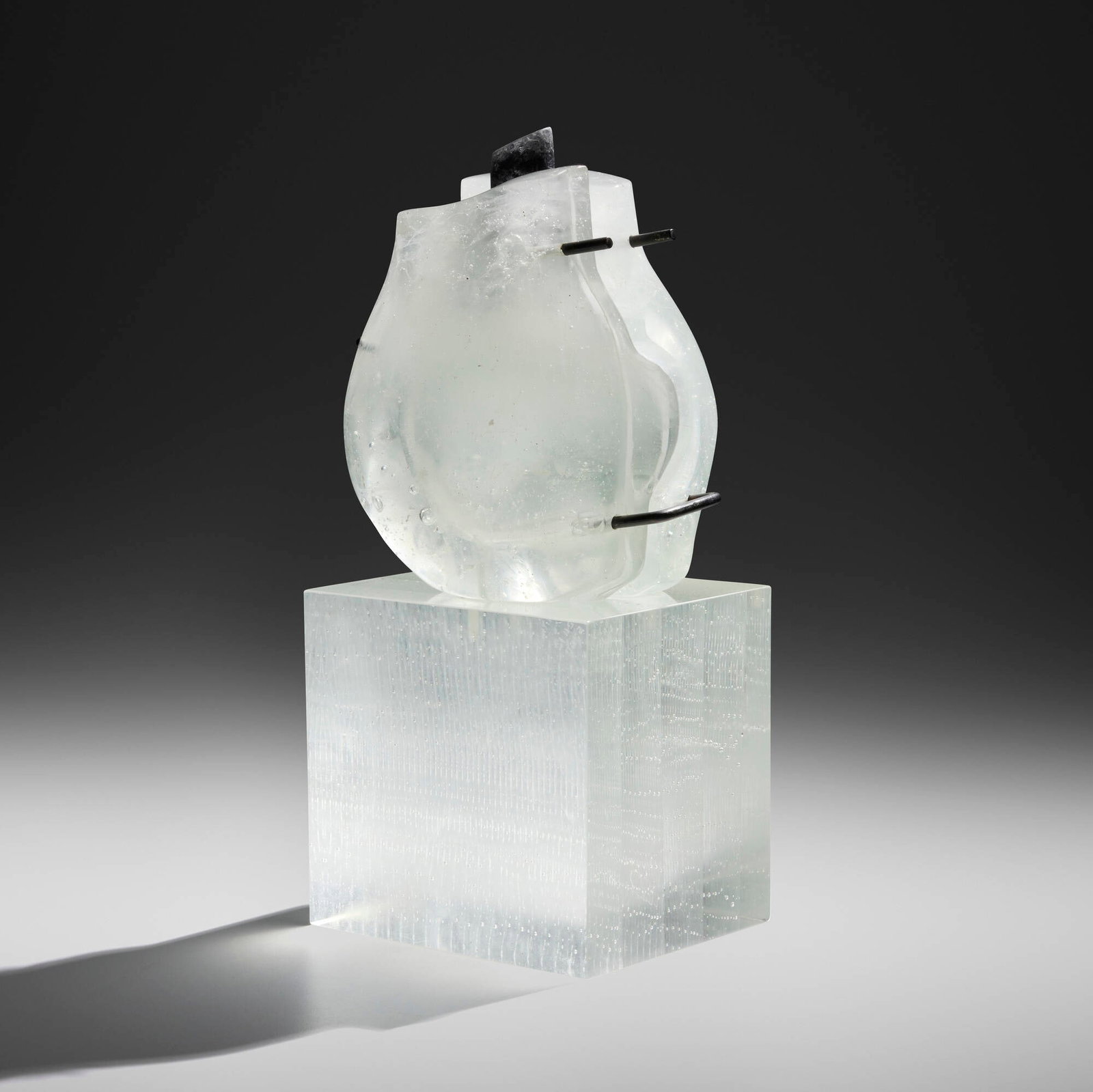 Clifford Rainey, Untitled VII: Clifford Rainey Untitled VII 1991 cast glass, patinated steel 16.75 h x 8 w x 6.25 d in (43 x 20 x 16 cm) Etched signature, date, and number to cub 'Rainey '91 VII'. This work