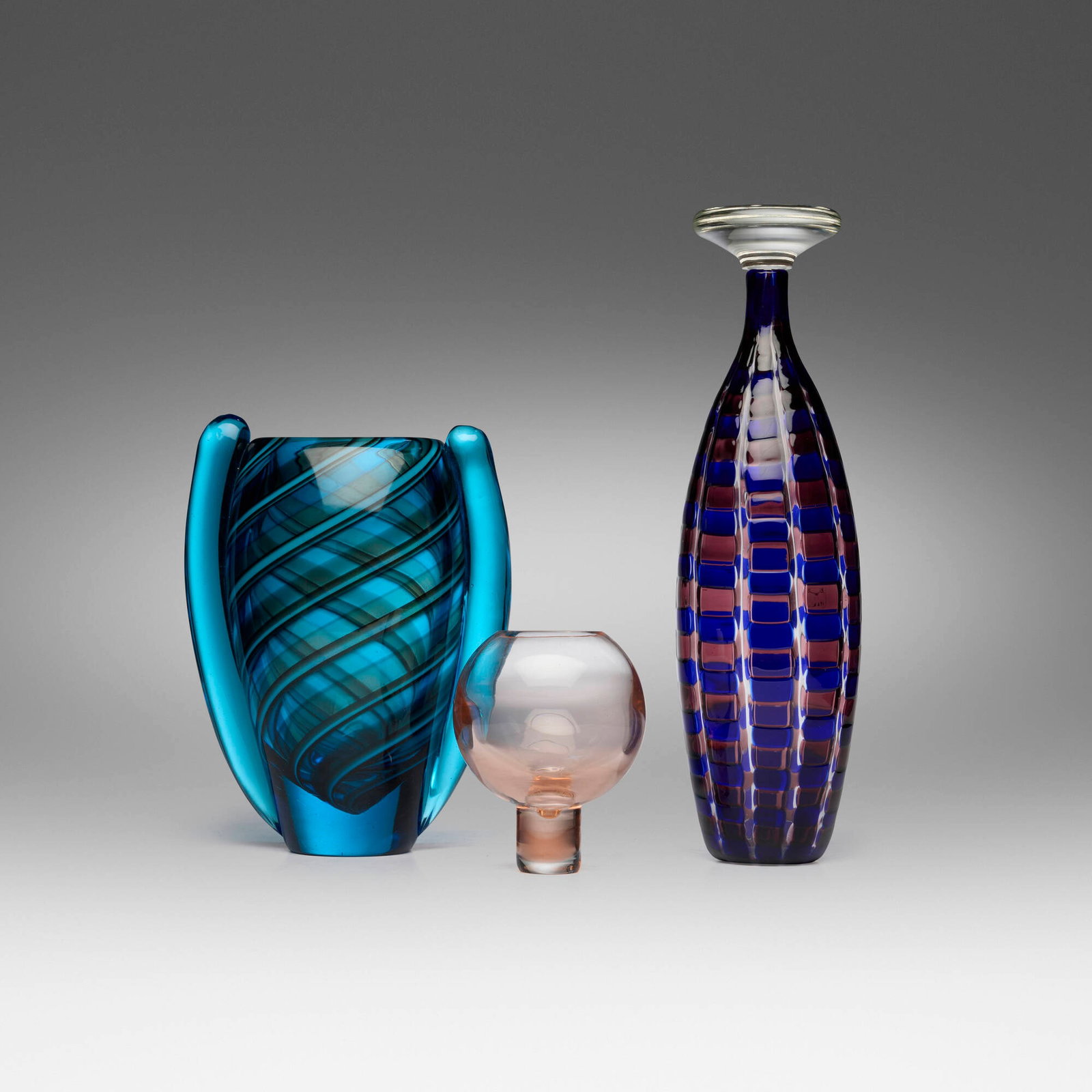 Yoichi Ohira and Laura de Santillana, Vase, stoppered bottle, and stopper: Yoichi Ohira and Laura de Santillana Vase, stoppered bottle, and stopper 1987, 1990, 1993 glass 16.375 h x 4.625 dia in (42 x 12 cm) 11.25 h x 8.5 w x 5.875 d in (29 x 22 x 15 cm) 5.75 h x 4.75 dia