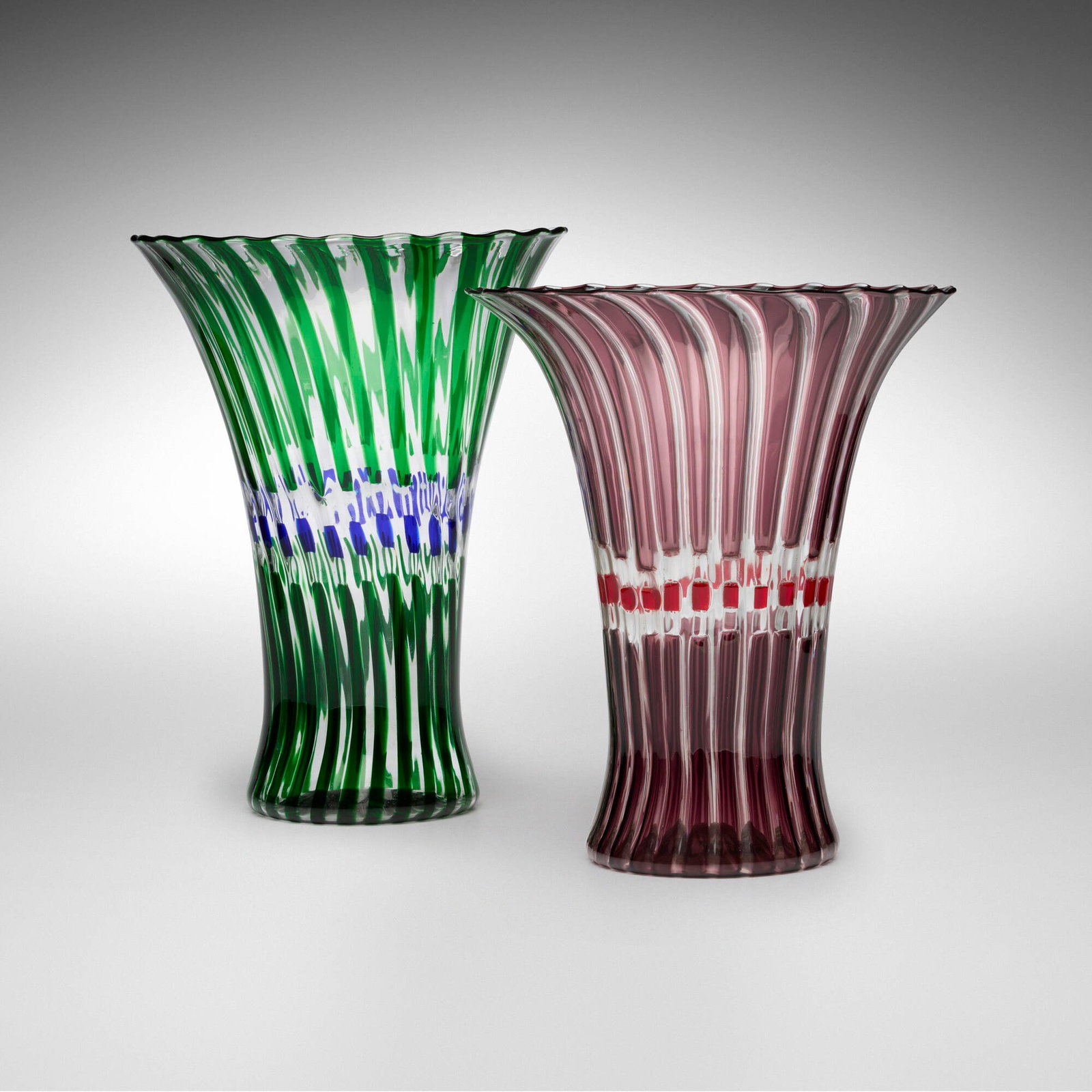 Laura de Santillana, Flora vases, set of two: Laura de Santillana Flora vases, set of two Eos 1993 hand-blown glass 12.125 h x 8.875 w x 9.15 d in (31 x 23 x 23 cm) 11 h x 9.25 w x 9.625 d in (28 x 23 x 24 cm) Etched signature and date to