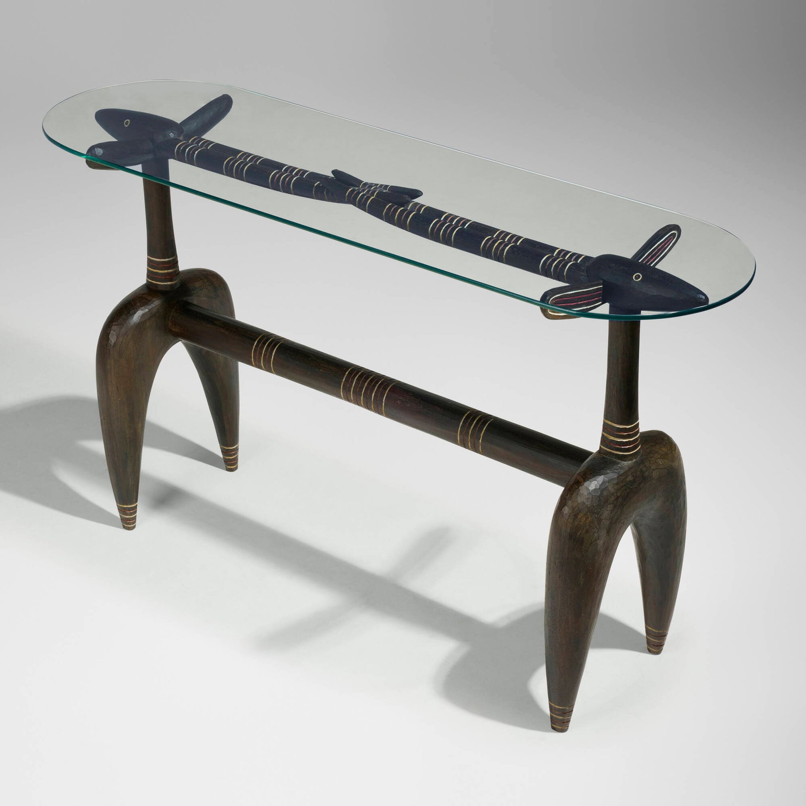 Judy Kensley McKie, Gazelle console table: Judy Kensley McKie Gazelle console table USA, 1987 carved, painted, and ebonized mahogany, glass 34.5 h x 60 w x 18 d in (88 x 152 x 46 cm) Carved signature and date to underside '? JKM