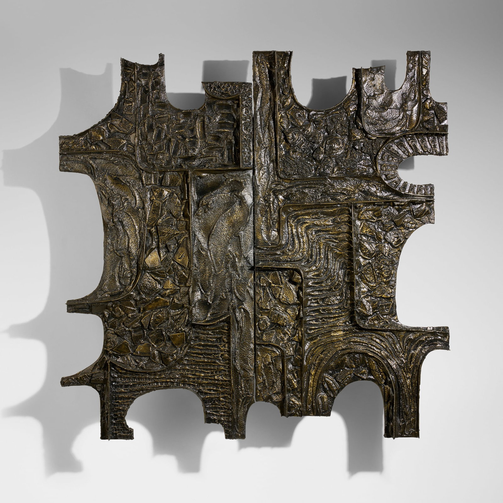 Paul Evans, Rare Sculpted Bronze wall-hanging cabinet: Paul Evans Rare Sculpted Bronze wall-hanging cabinet Paul Evans Studio USA, 1970 bronze resin over wood, mirrored glass, glass 72.25 h x 73 w x 20 d in (184 x 185 x 51 cm) This unique work is an