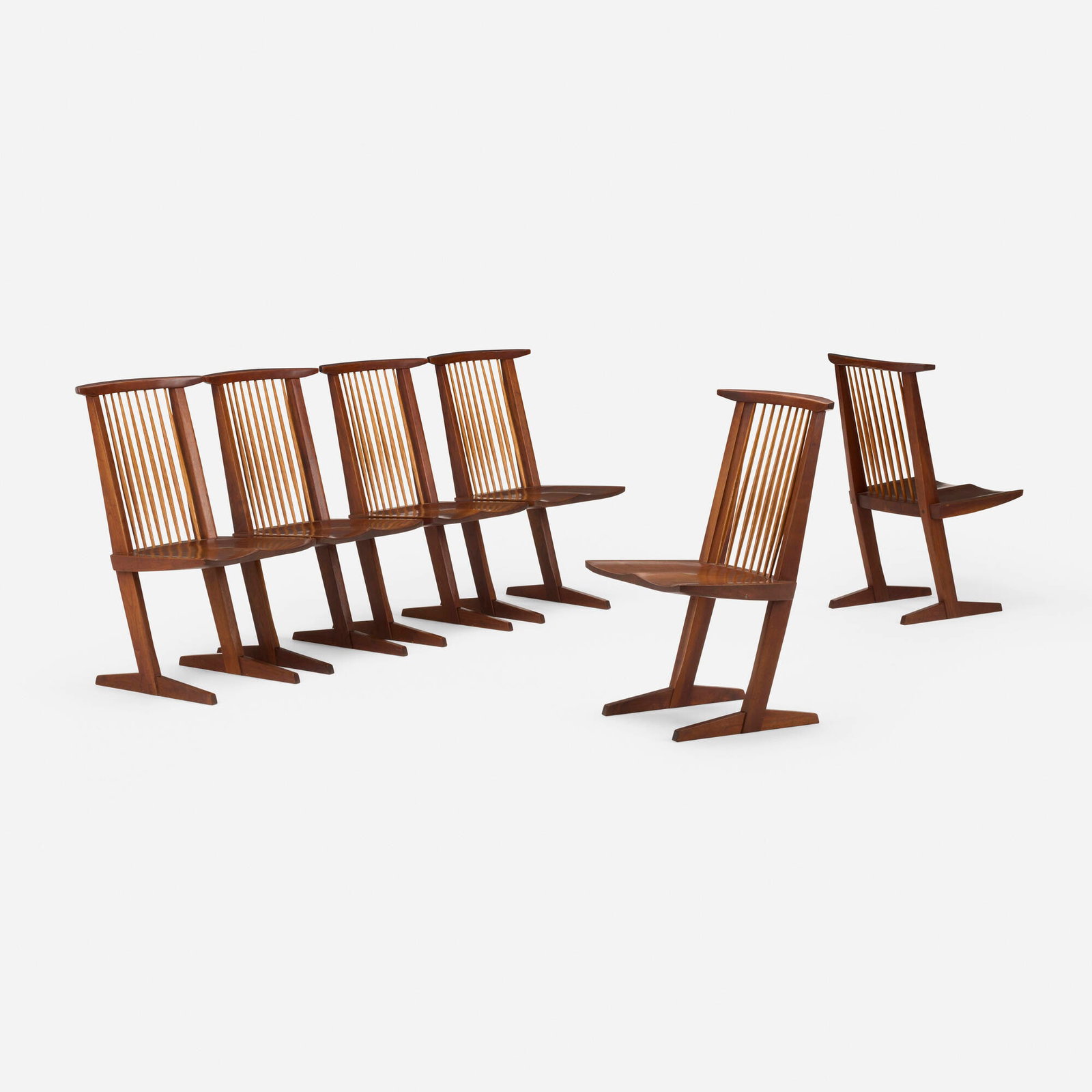 George Nakashima, Conoid chairs, set of six: George Nakashima Conoid chairs, set of six Nakashima Studio USA, 1974 American black walnut, hickory 35.5 h x 20 w x 22.5 d in (90 x 51 x 57 cm) Inscribed with client's name to underside of each