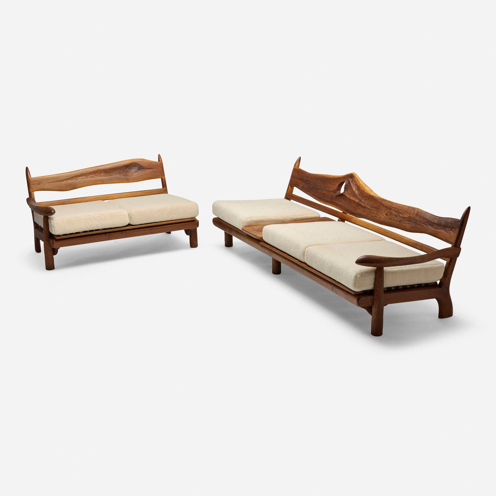 Phillip Lloyd Powell, Sofa and settee: Phillip Lloyd Powell Sofa and settee USA, 1979 walnut, sheepskin, wenge, oak sofa: 29.75 h x 90 w x 34 d in (76 x 229 x 86 cm) settee: 29 h x 54 w x 34 d in (74 x 137 x 86 cm) Sofa features a