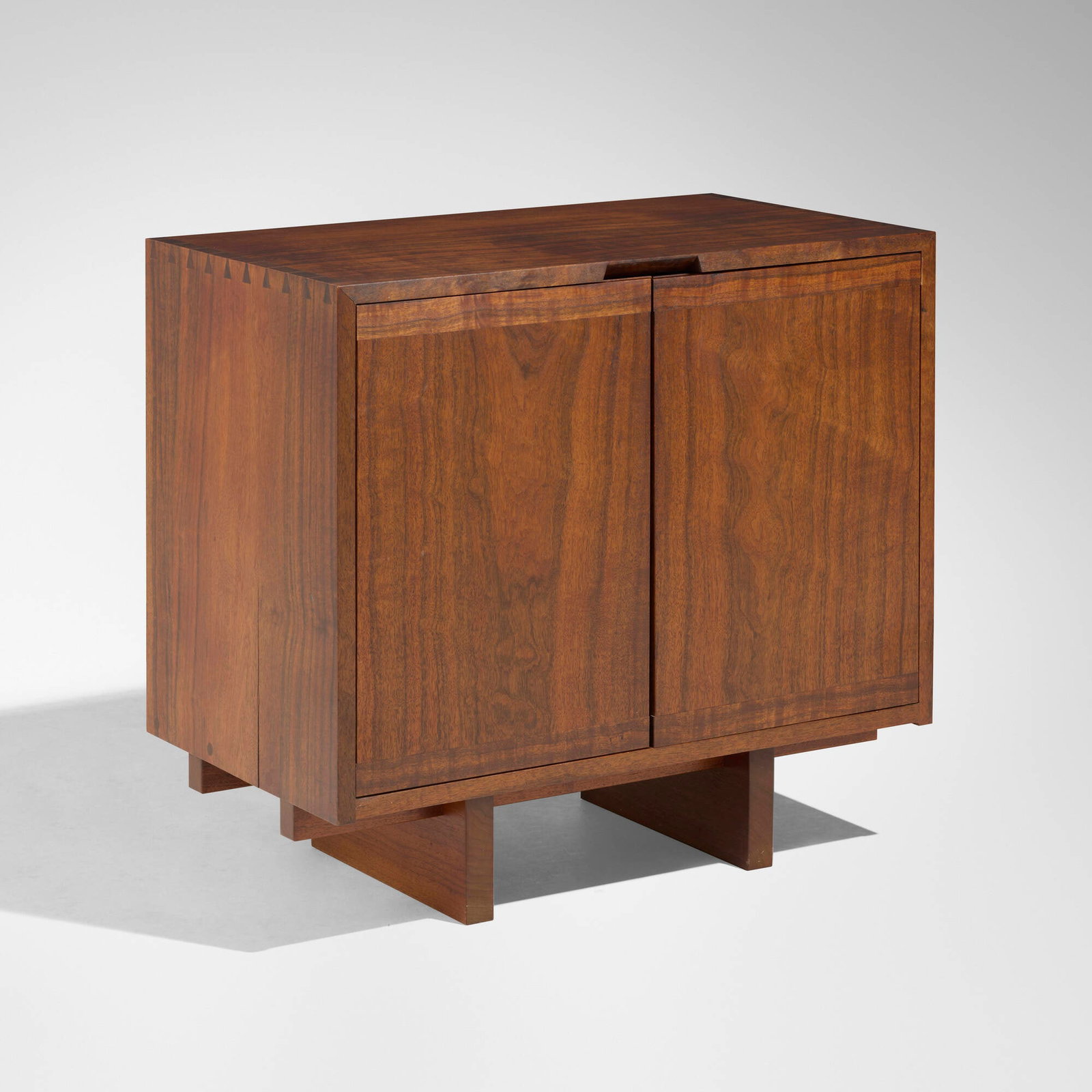 George Nakashima, Early special-order Chest: George Nakashima Early special-order Chest Nakashima Studio USA, 1957 figured laurel, American black walnut 28.25 h x 30.25 w x 18 d in (72 x 77 x 46 cm) Chest features two doors concealing two adjust