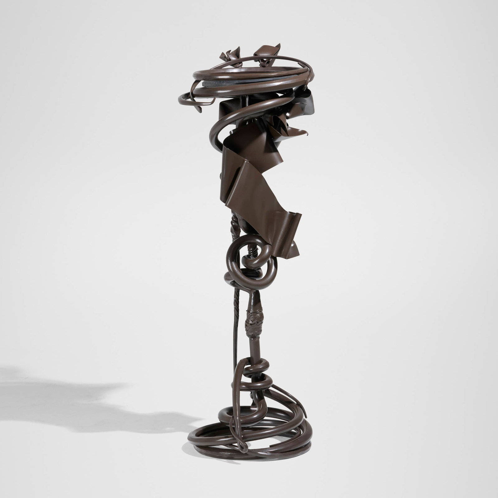 Albert Paley, Plant stand: Albert Paley Plant stand USA, 1993 forged and fabricated steel, slate 50.375 h x 19 dia in (128 x 48 cm) Impressed signature and date to base 'Albert Paley 1993'. This work is from an editio