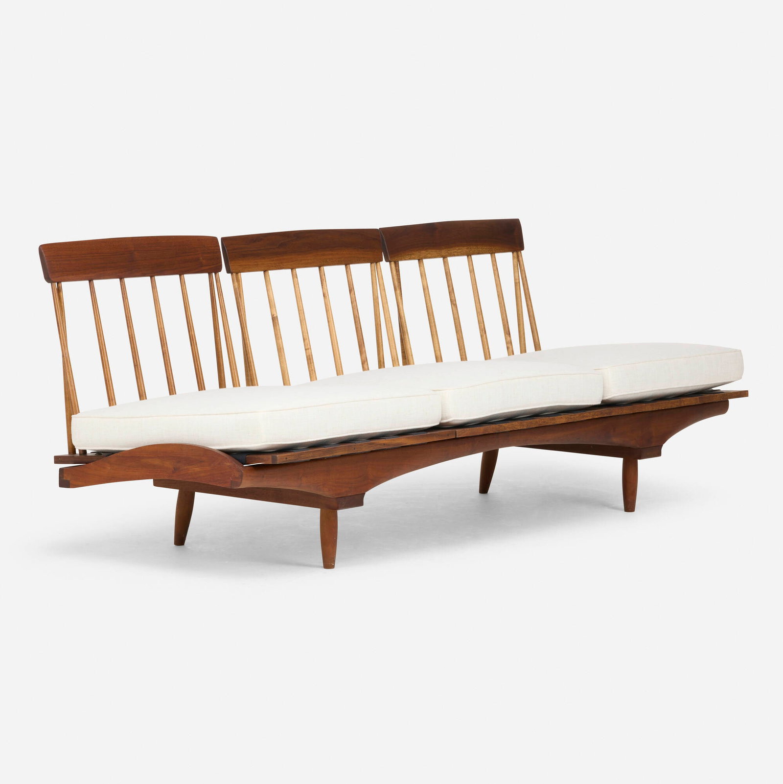 Phillip Lloyd Powell, Modular bench: Phillip Lloyd Powell Modular bench USA, c. 1960 walnut, upholstery, webbing 29.5 h x 74 w x 29.25 d in (75 x 188 x 74 cm) Bench features three modul seats allowing for various seating configurations.
