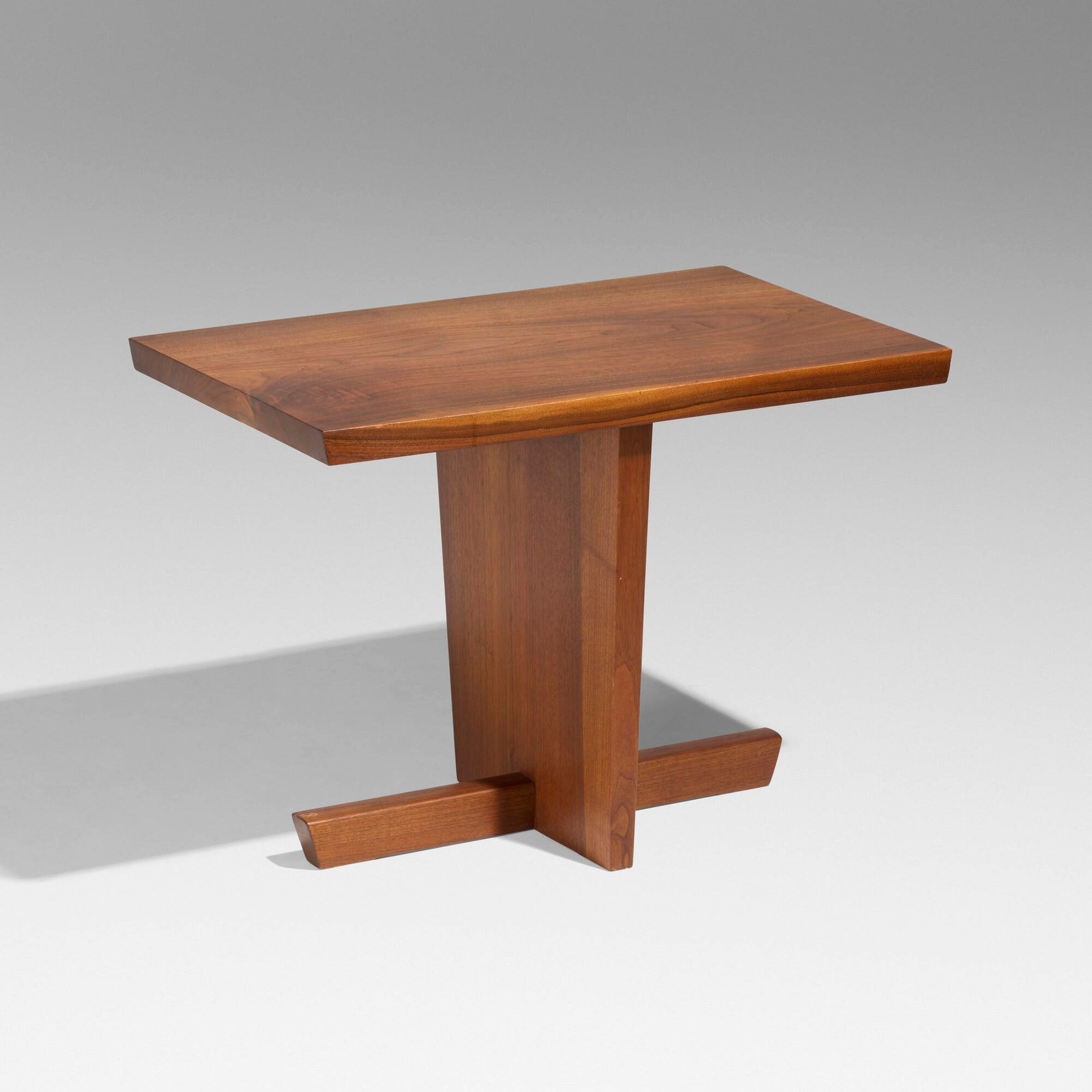 George Nakashima, Minguren I end table: George Nakashima Minguren I end table Nakashima Studio USA, 1972 American black walnut 22.25 h x 30 w x 20 d in (57 x 76 x 51 cm) Table features a single slab top. Inscribed with client's name