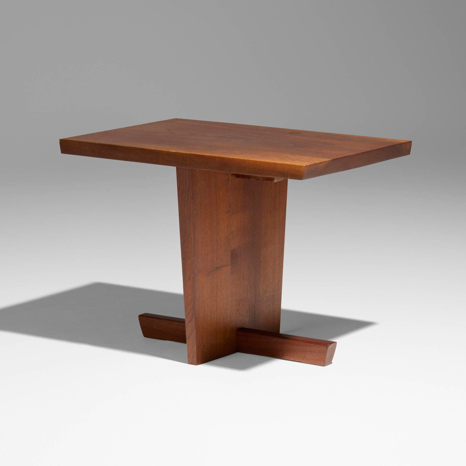 George Nakashima, Minguren I end table: George Nakashima Minguren I end table Nakashima Studio USA, 1972 American black walnut 22.25 h x 30 w x 20 d in (57 x 76 x 51 cm) Table features a single slab top. Inscribed with client's name
