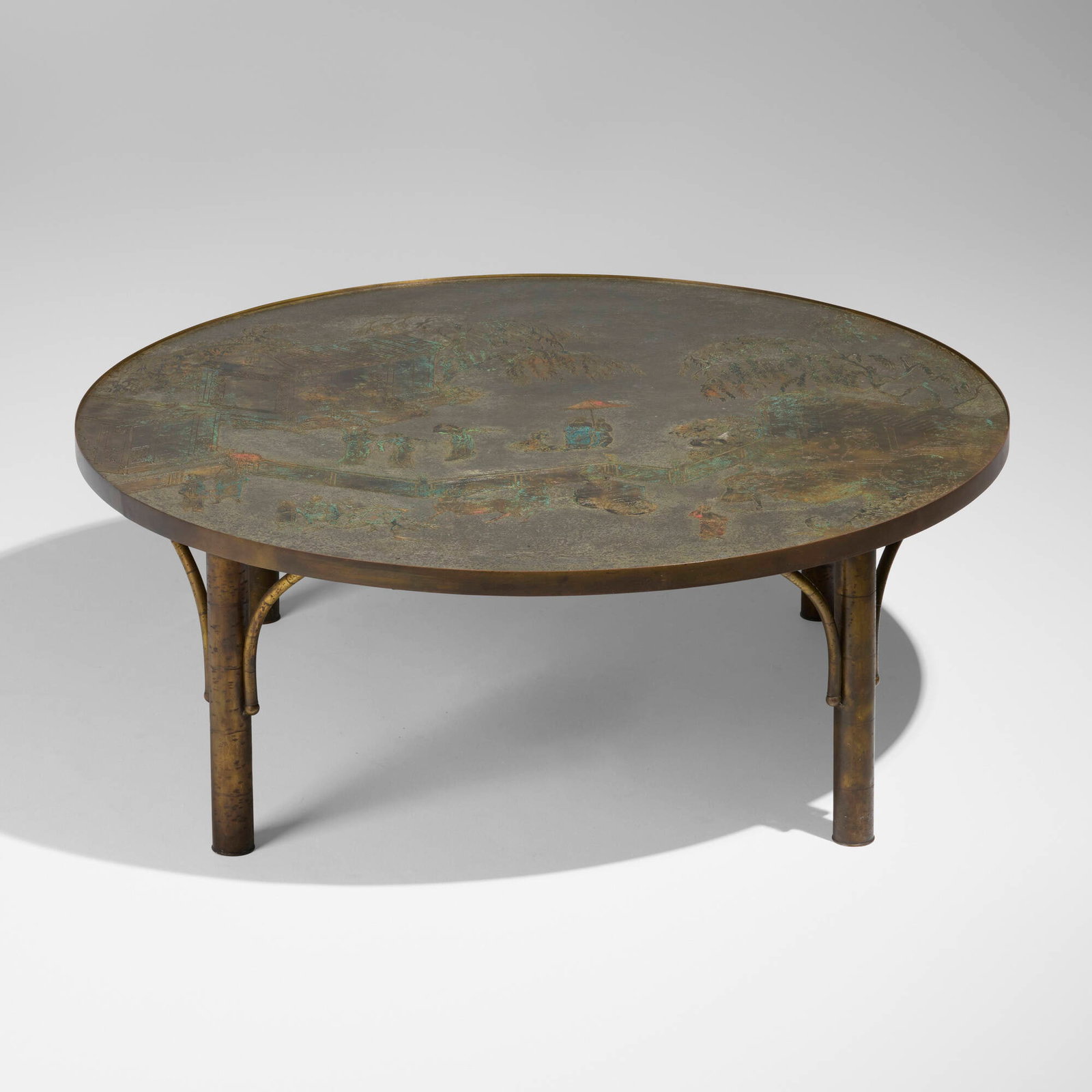 Philip and Kelvin LaVerne, Sutao coffee table: Philip and Kelvin LaVerne Sutao coffee table USA, c. 1965 acid-etched and patinated brass over pewter and wood 17.375 h x 47.5 dia in (44 x 121 cm) Raised signature to top 'Philip + Kelvin
