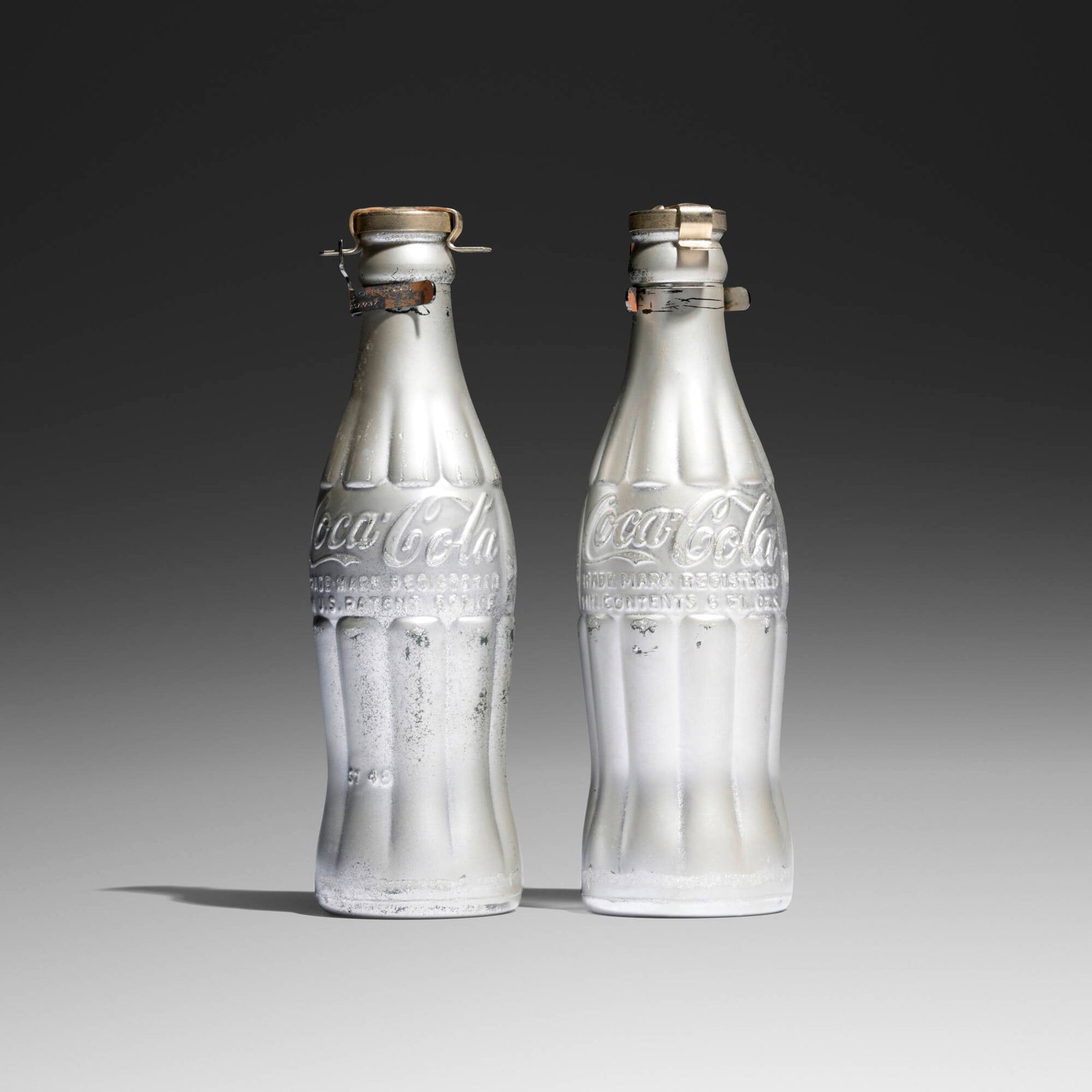 Andy Warhol, You're In (two works): Andy Warhol You're In (two works) 1967 spray paint on Coca-Cola bottle each: 8 h x 2.375 w x 2.375 d in (20 x 6 x 6 cm) In 1967, the Arts Council of the Philadelphia Y.M.H.A. presented Museum of