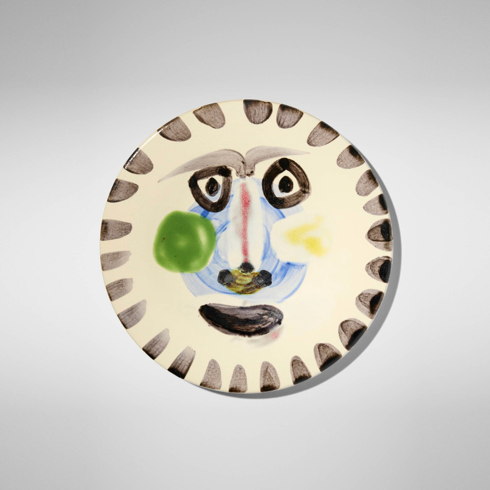 Pablo Picasso, Visage No. 202: Pablo Picasso Visage No. 202 1963 white earthenware clay, decoration in engobes and enamel under glaze 0.75 d x 9.875 dia in (2 x 25 cm) Glazed studio marks to verso 'No. 202 Edition Picasso 346/