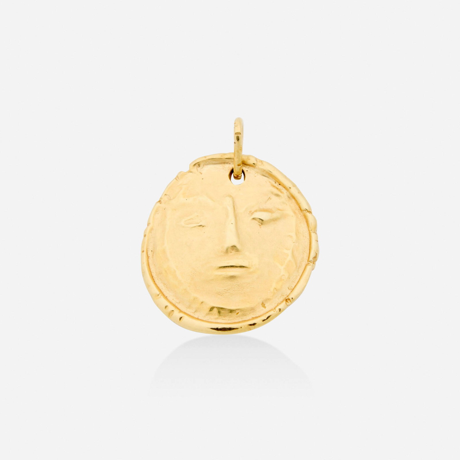 After Pablo Picasso, Visage de femme: After Pablo Picasso Visage de femme 1949 / cast later 18k gold 1.563 h x 1.25 w in (4 x 3 cm) Stamped to verso 'Madoura Empriente Originale de Picasso'. This work is from the edition of un