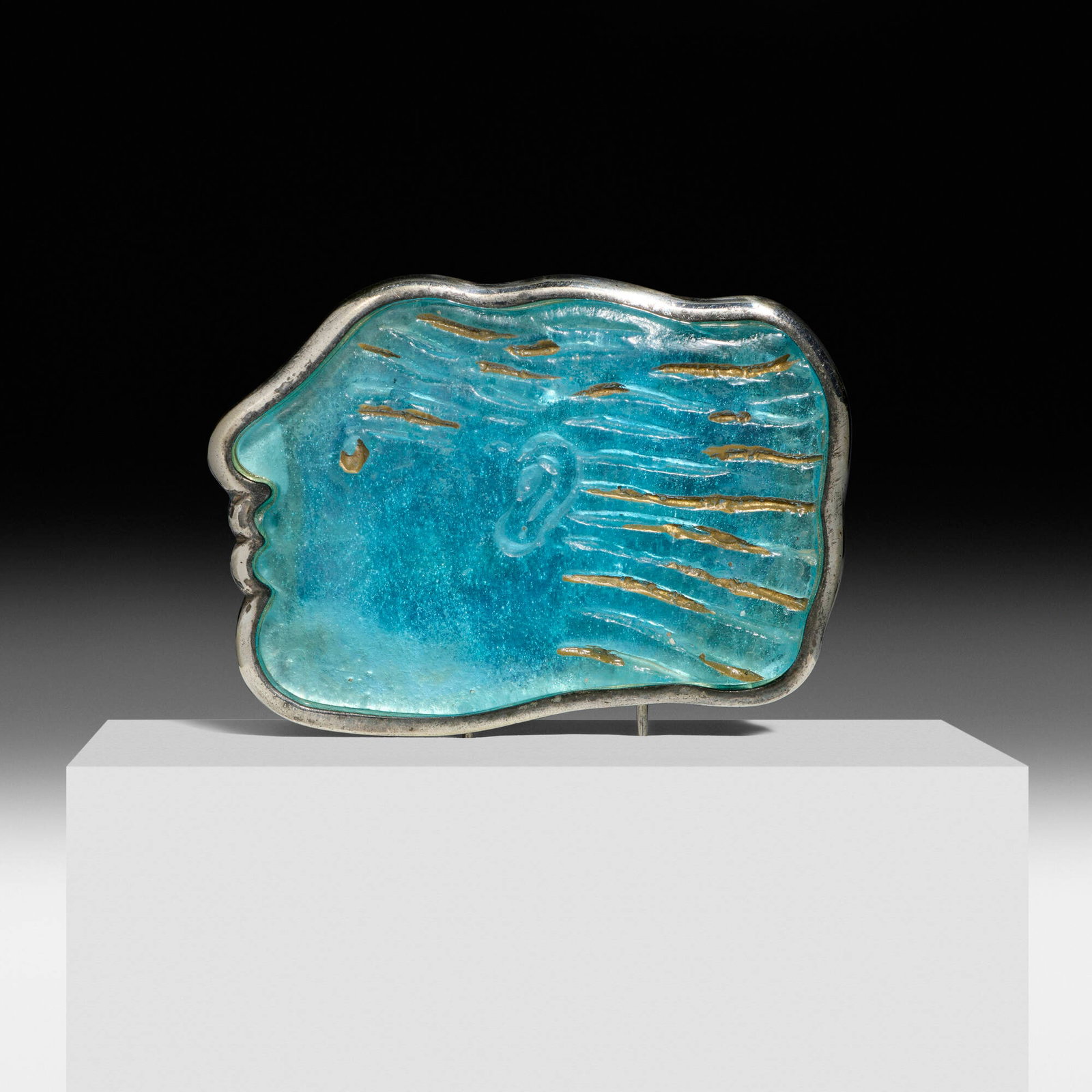 Alekos Fassianos and Daum, 'Idilios' brooch: Alekos Fassianos and Daum 'Idilios' brooch c. 1990 steel, pate de verre 2.75 w x 2 l in (7 x 5 cm) Signed 'A. Fassianos Daum France'. The glass face was produced by Daum and the brooch was e