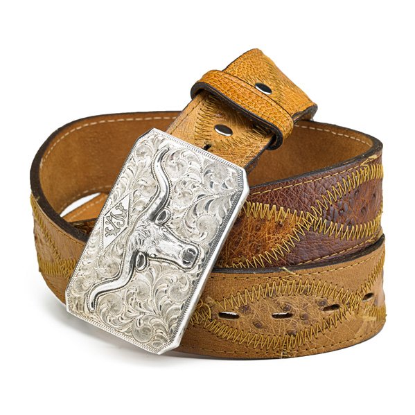 BOHLIN STERLING HOLLYWOOD BELT BUCKLE: John Wayne fan gift depicting a longhorn in relief with foliate decoration on Fort Worth leather belt; Buckle engraved on back with Wayne's given name Marion M. Morrison, marked for Bohlin; Buckle: 2"