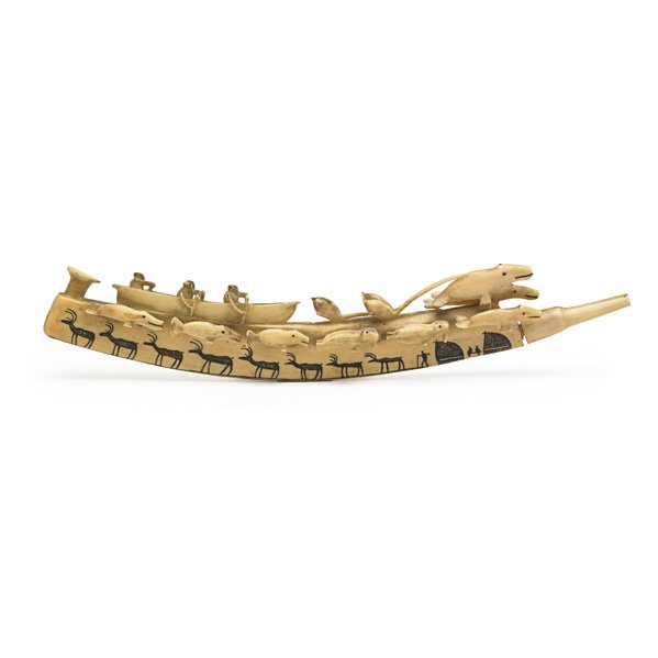 INUIT KAYAK IVORY OPIUM PIPE: Whale hunters in a canoe, early 20th c.; Professionally conserved, mouthpiece repaired; 11 1/2"