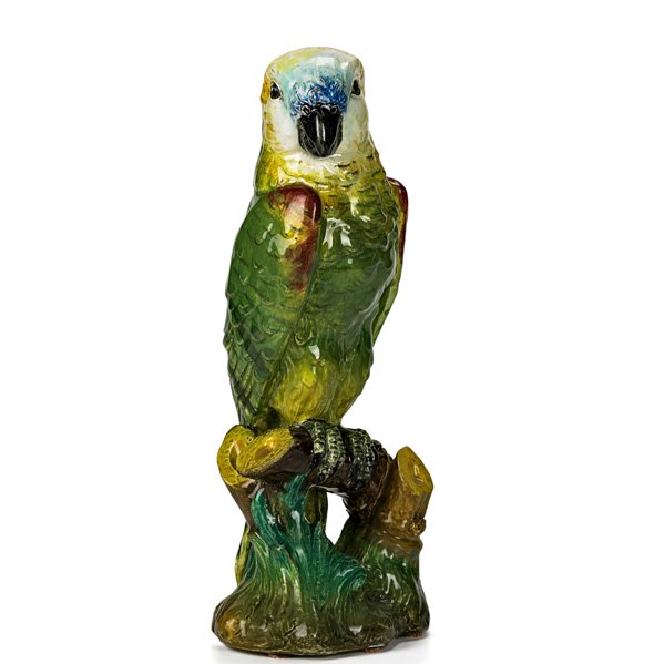 MAJOLICA DELPHIN MASSIER PARROT: Perched on a bamboo branch, early 20th c.; Signed; 14"