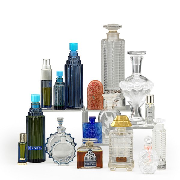 20TH C. PERFUME BOTTLES: Seventeen pieces including "Lilas" for Worth, "Je Reviens," Marcel Rochas, Guerlain "L'Heure Bleue," Caron, "Tzigane," "Requette," "L'Origan de Coty," "Martine" and "Les Yeux Bleus" for Canarina; Most