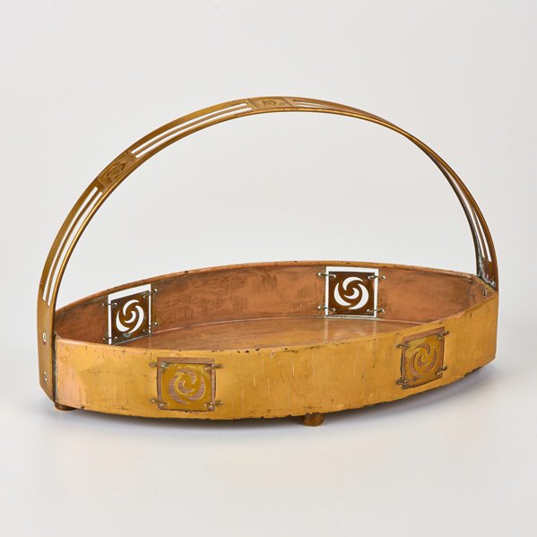 SECESSIONIST STYLE: Table basket, ca. 1907; Cold painted brass to imitate birch bark with brass handle and decoration; Unmarked; 7 1/2" x 11 1/4" x 6 1/4"