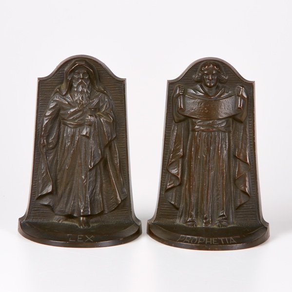 LOUIS GUDEBROD: Pair of bookends depicting Moses and Isaiah, USA, 1915; Patinated metal; Impressed signatures, dated; Each: 7 1/2" x 5 1/4" x 3 1/4"