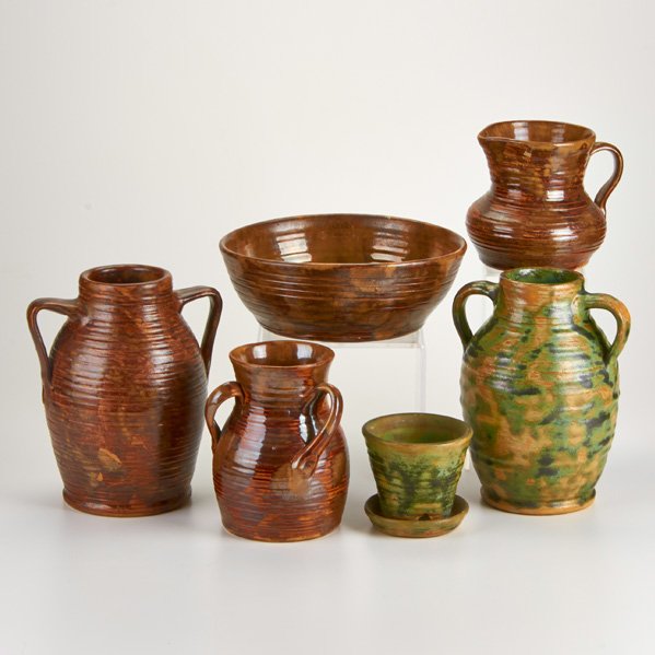 FULPER: Six pieces of Colonial ware: Three vases, pitcher, planter, bowl, Flemington, NJ, 1920s; Glazed earthenware; Racetrack marks on all but one; Tallest: 9"