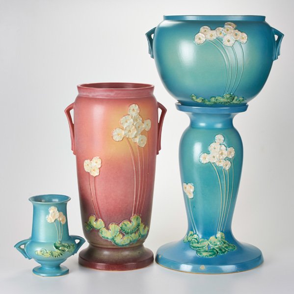 ROSEVILLE: Primrose umbrella stand (773), two-handled vase (766-8), jardinière (634-10) and pedestal, Zanesville, OH, late 1930s; Glazed earthenware; Die-impressed marks to three; Tallest: 29 1/4"