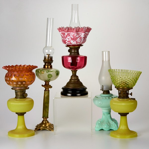 OIL LAMP GROUP: Five table lamps, each with glass font and metal mounts, one with alabaster shaft, one electrified, USA, 19th/20th c.; One illegibly marked; Tallest: 28 1/2" x 6" dia.