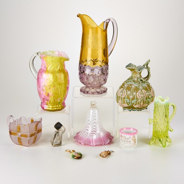 GLASS GROUP: Four pitchers, smoke cap, ink bottle, most in colored glass, together with two porcelain pieces and two shell trinkets, 20th c.; One illegibly marked; Tallest: 12 1/2"