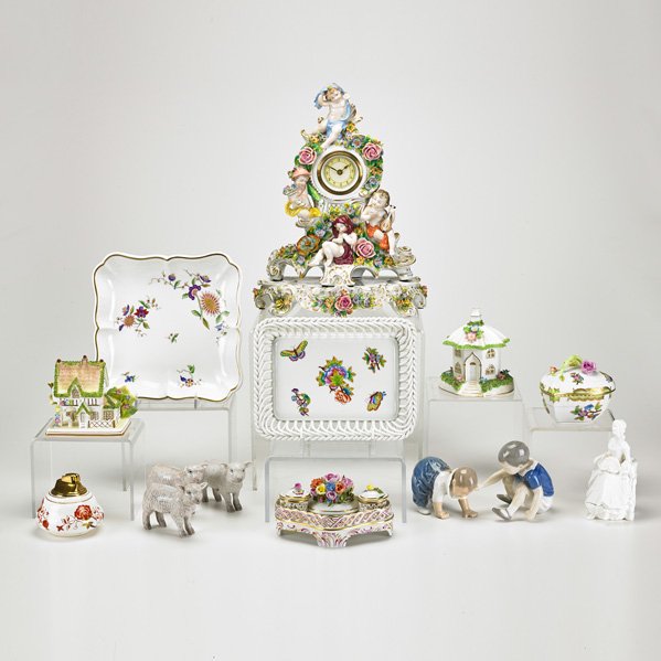 ROYAL COPENHAGEN; SITZENDORF; ETC.: Fourteen porcelain pieces, 20th c.; Includes Royal Copenhagen crawling baby, Sitzendorf mantle clock with stand, etc.; All marked; Tallest (with stand): 13"