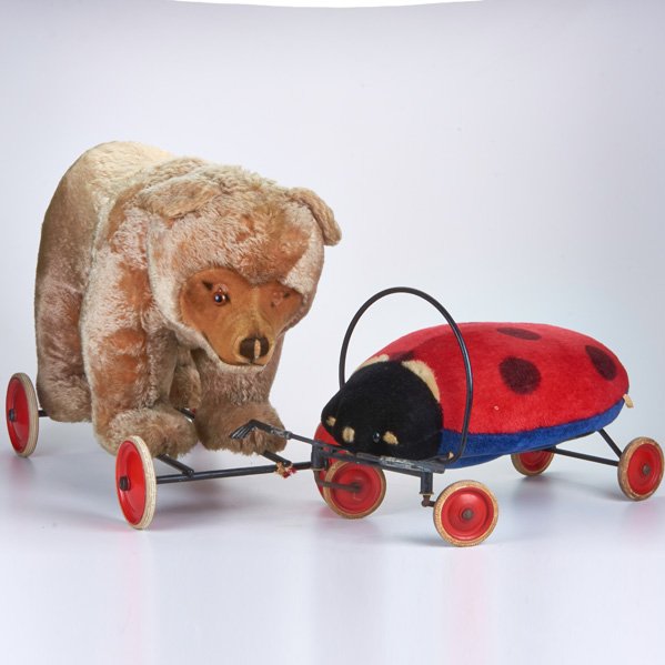 STEIFF (Attr.): Two plush riding toys: bear with growler and ladybug, both on wheels, Germany, 20th c.; Both unmarked; Bear: 18 1/2" x 29" x 12"